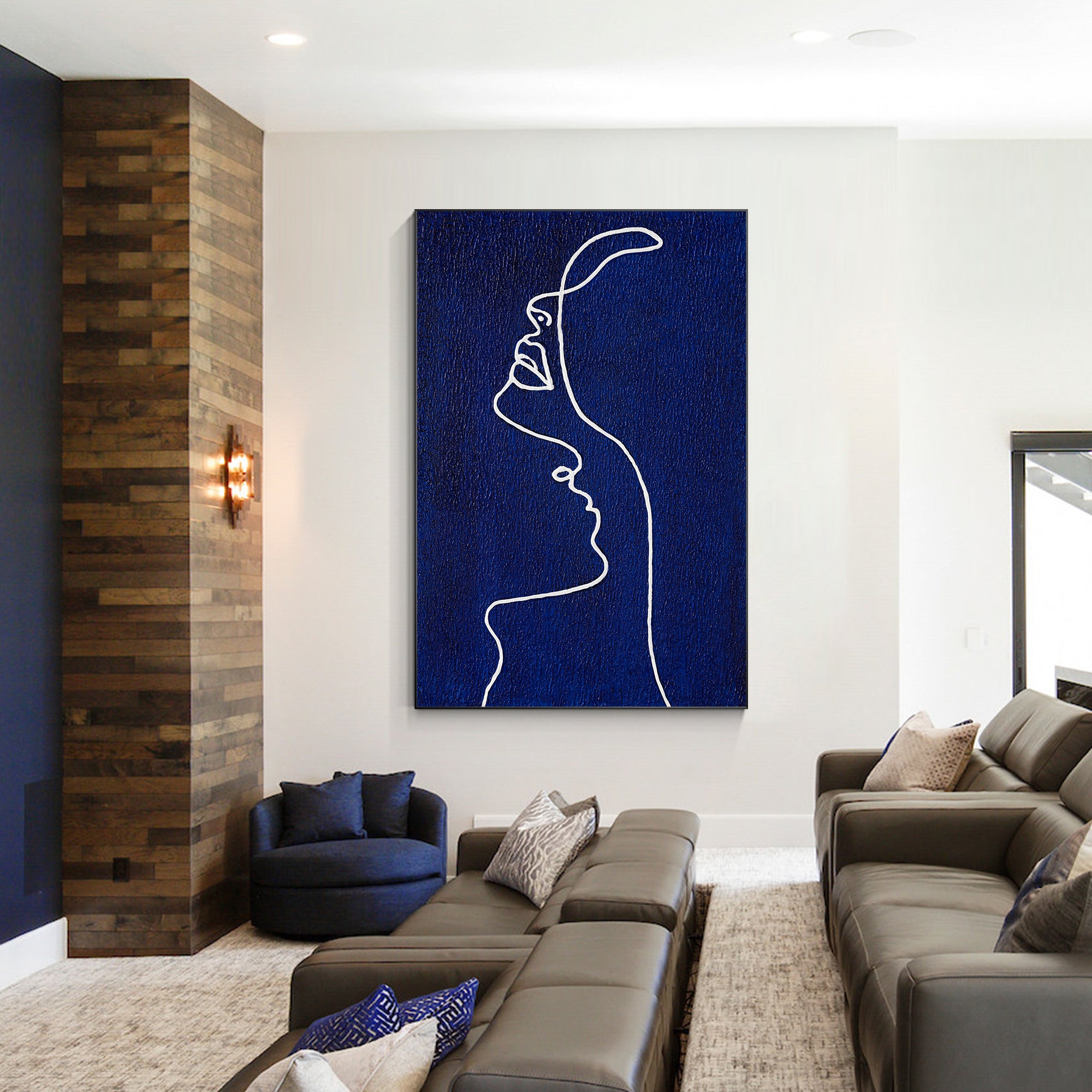 Picasso line art painting of a woman’s profile in navy blue on canvas, extra-large vertical framed wall art for minimalist and modern home decor.

