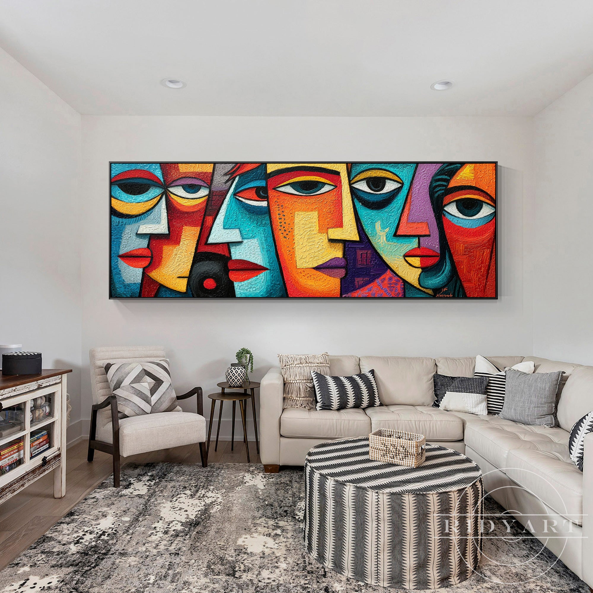 Cubist abstract canvas art with five colorful geometric faces in a gold frame.