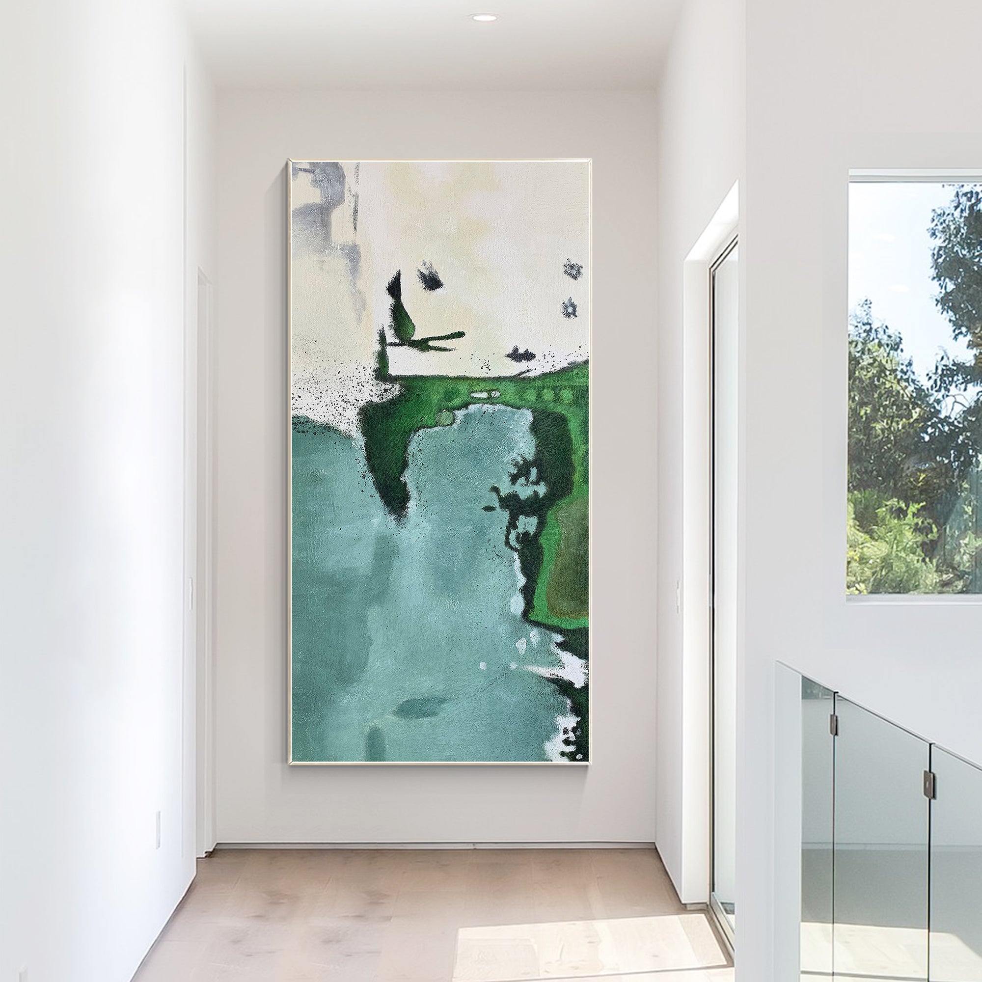 Bold brushstrokes in teal and green abstract artwork.