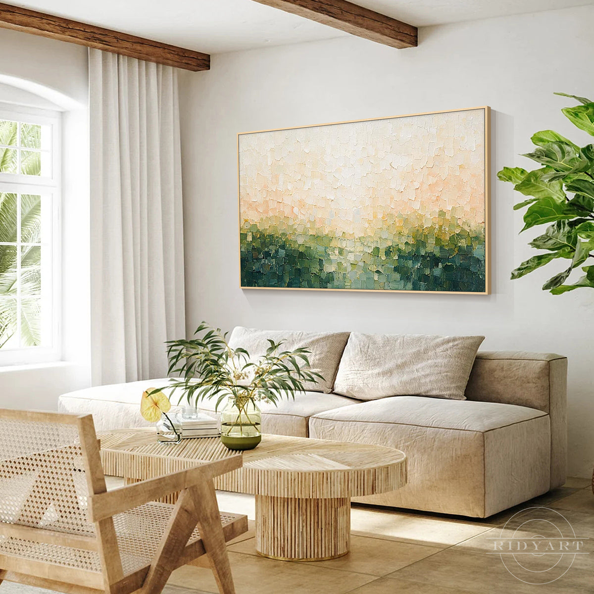 Framed modern abstract forest canvas print hanging on a neutral living room wall above a sofa.