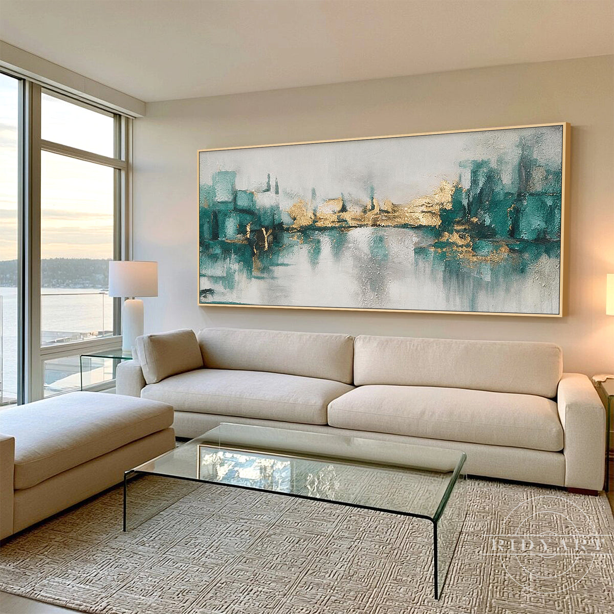 Modern abstract cityscape canvas painting hanging above a contemporary sofa in a light living room.