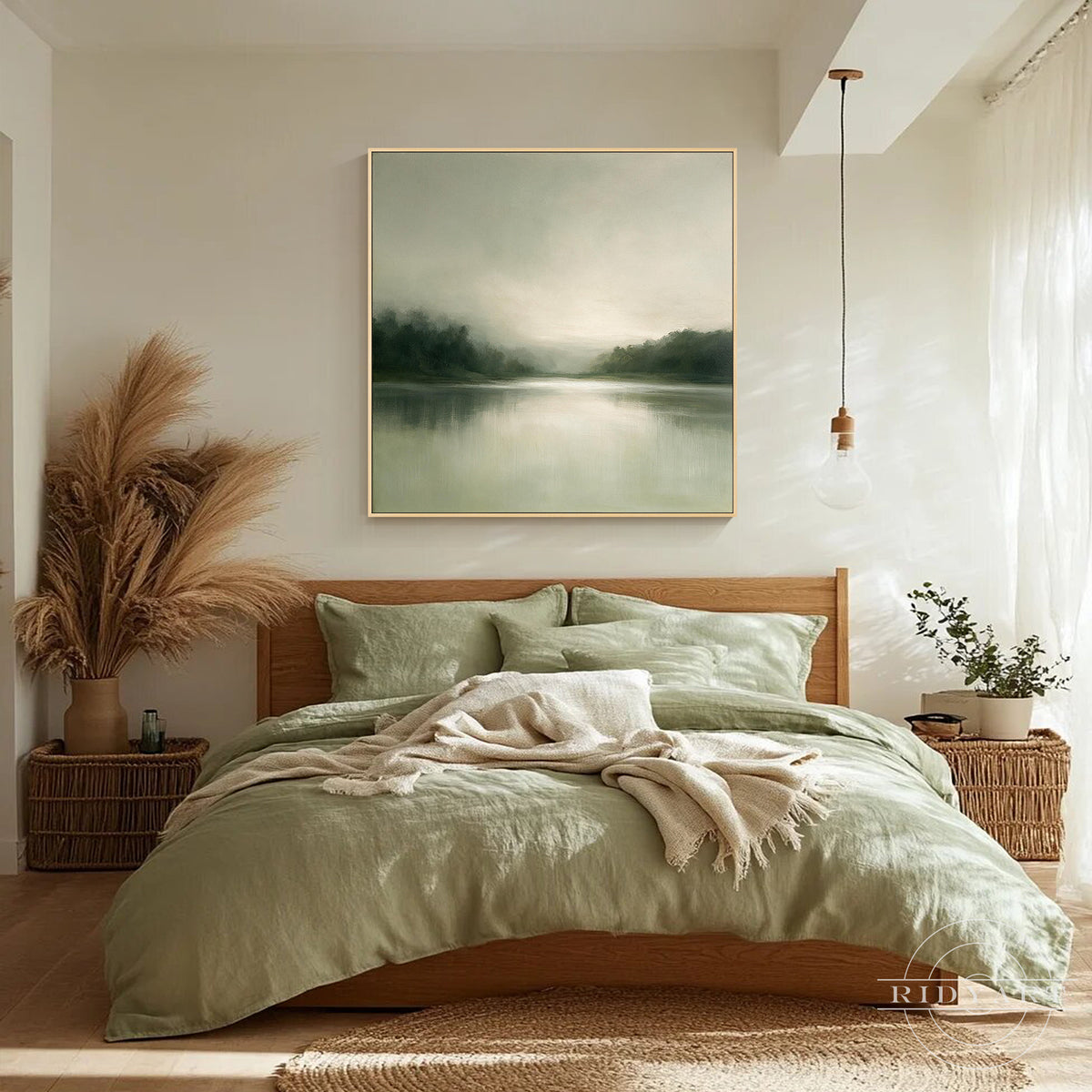 Framed atmospheric green landscape oil painting bringing tranquil nature beauty above a light wood console table in a Japandi living room.