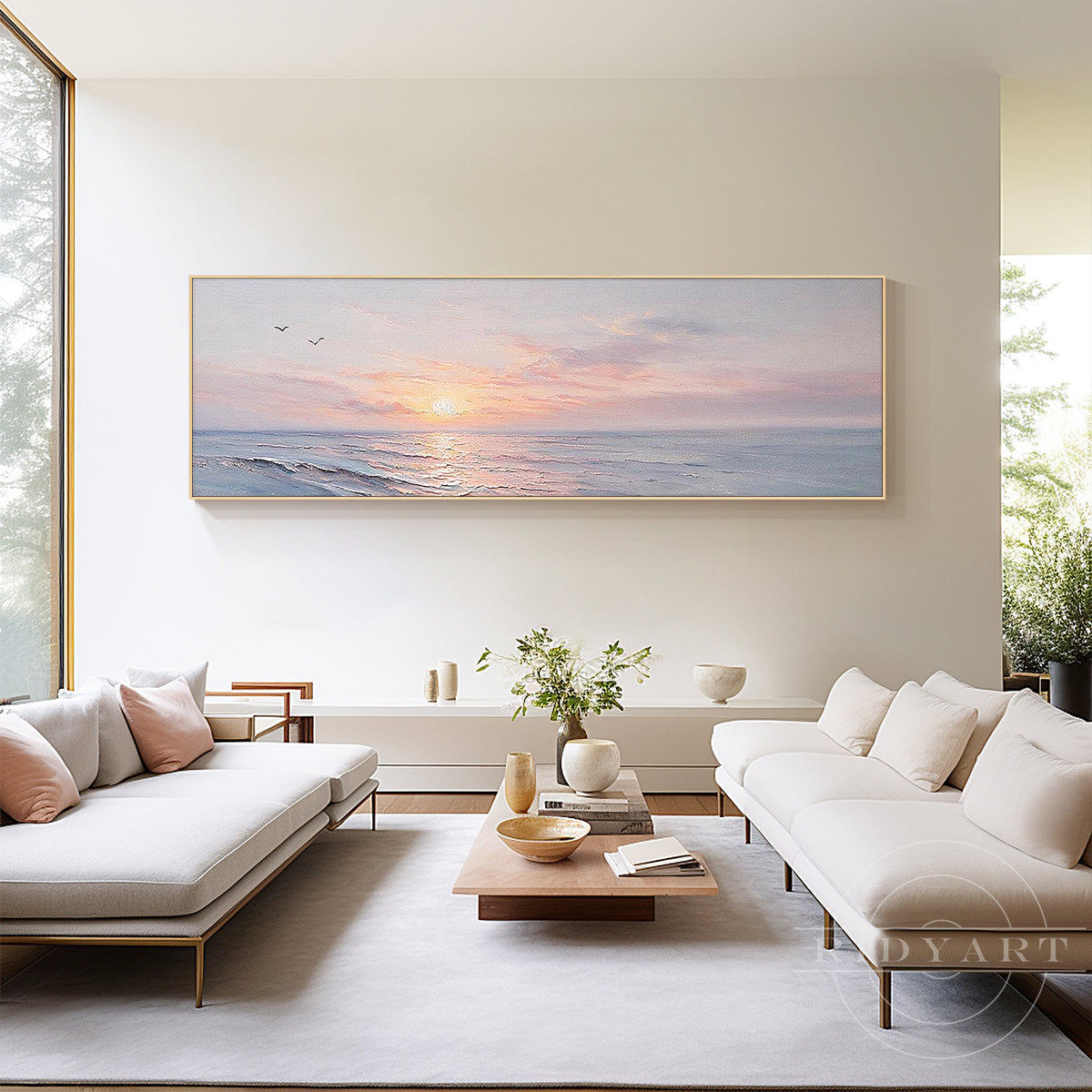 Soft pink sunrise ocean painting canvas art placed above a bedroom headboard