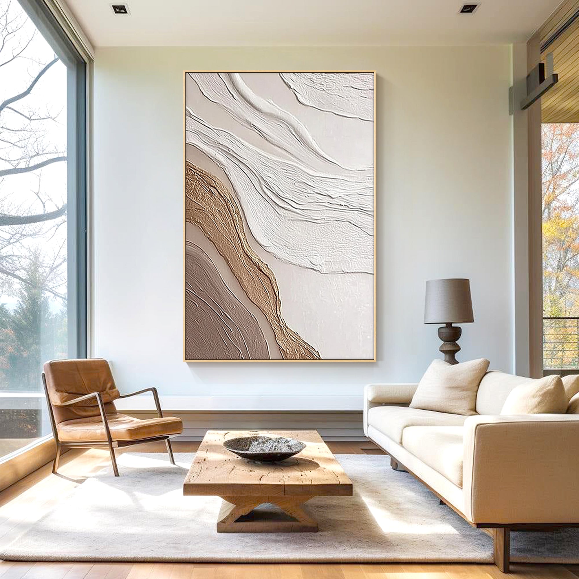 beige relief abstract canvas painting in minimalist interior