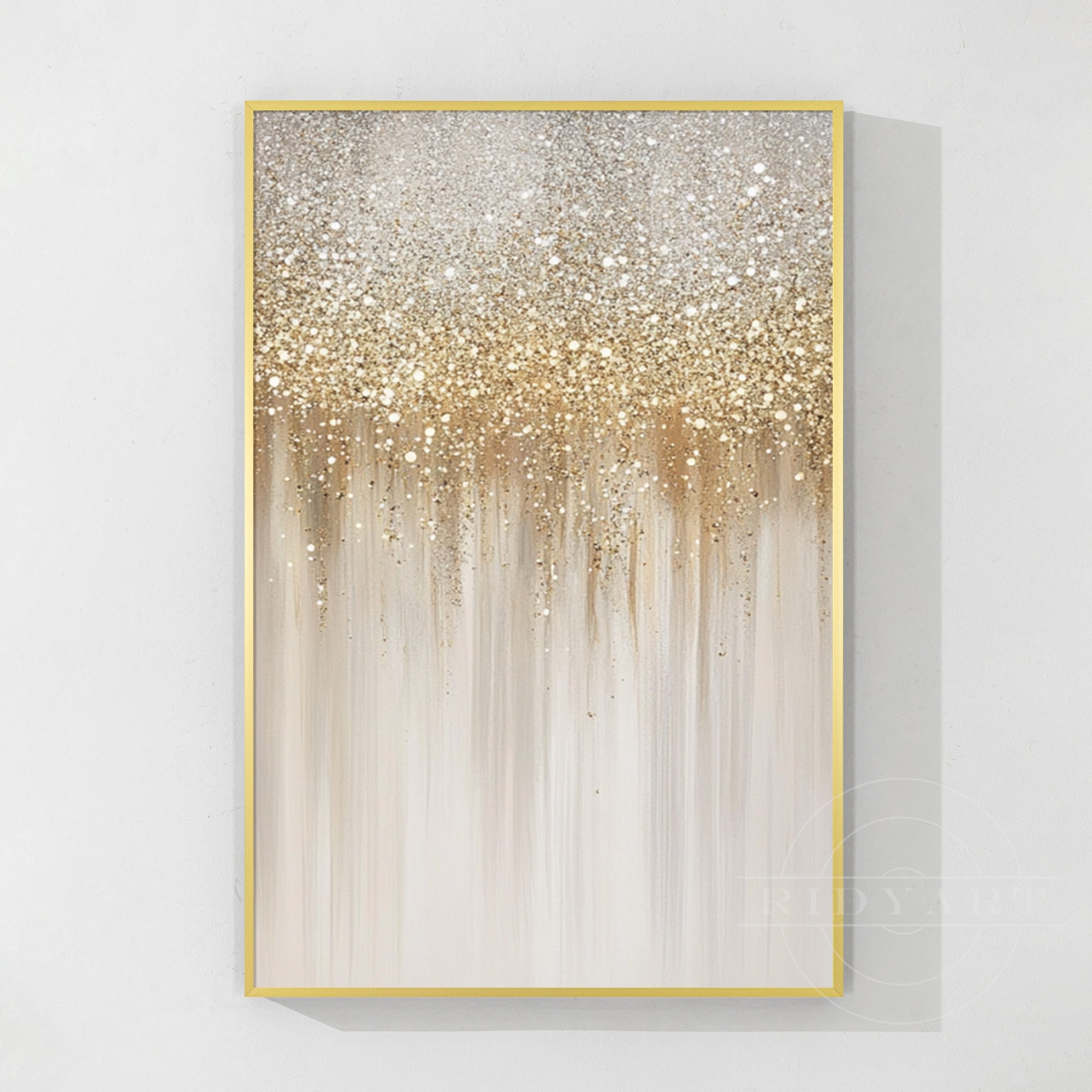 Champagne gold abstract wall art with textured neutral canvas in modern living room