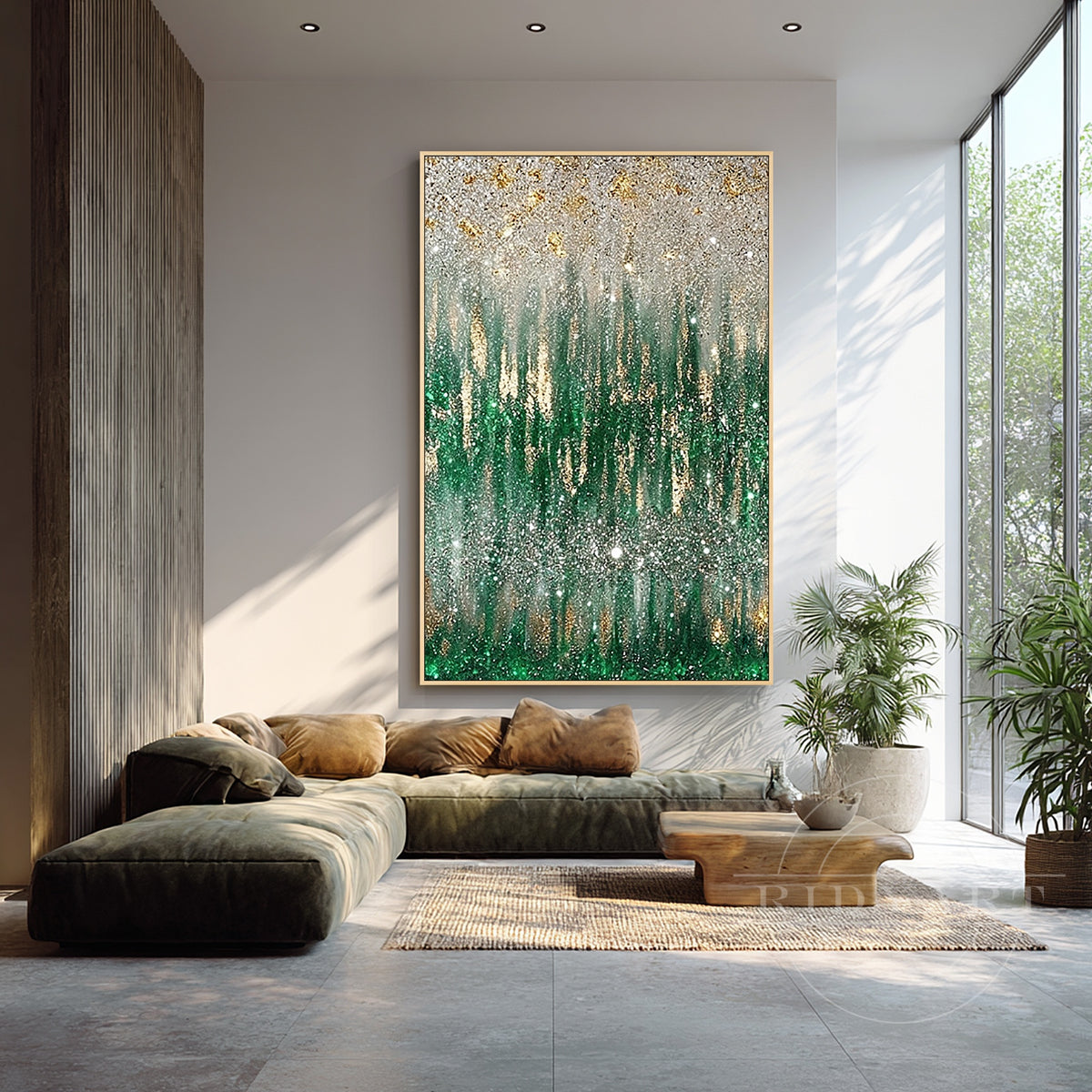 Hand-painted emerald green and gold abstract canvas art above a modern sofa in a living room.
