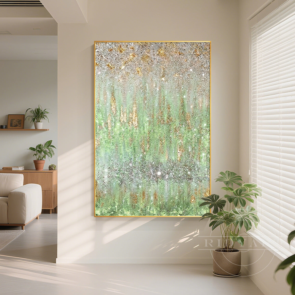 Large mint green and silver shimmering textured canvas painting displayed on a living room wall.