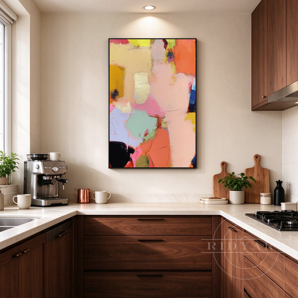 Colorful abstract wall art in peach, coral, pink, mint and yellow with a gold frame creating an artistic dining room focal point.
