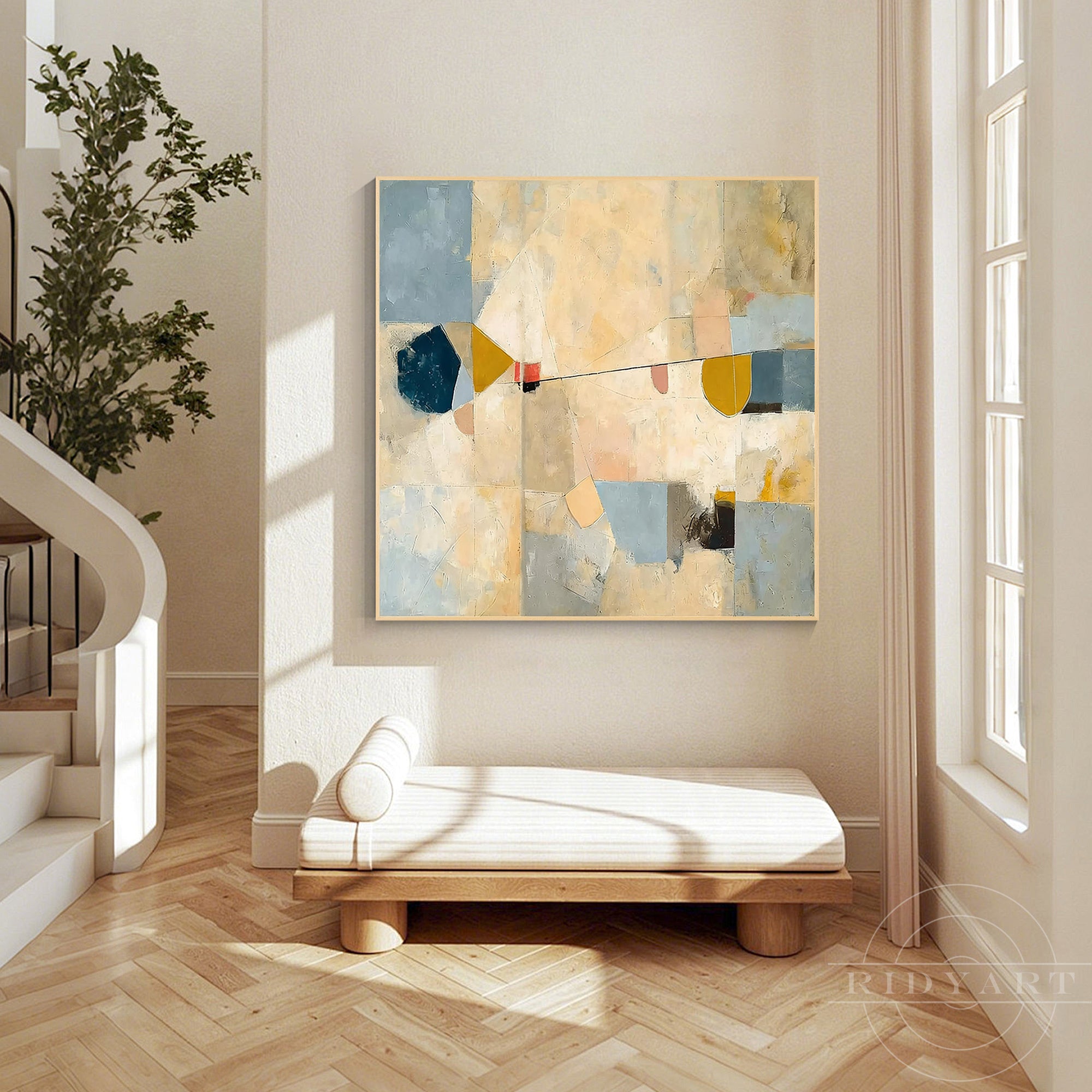 Textured beige and blue square abstract painting hanging in a modern organic hallway above a minimalist daybed.