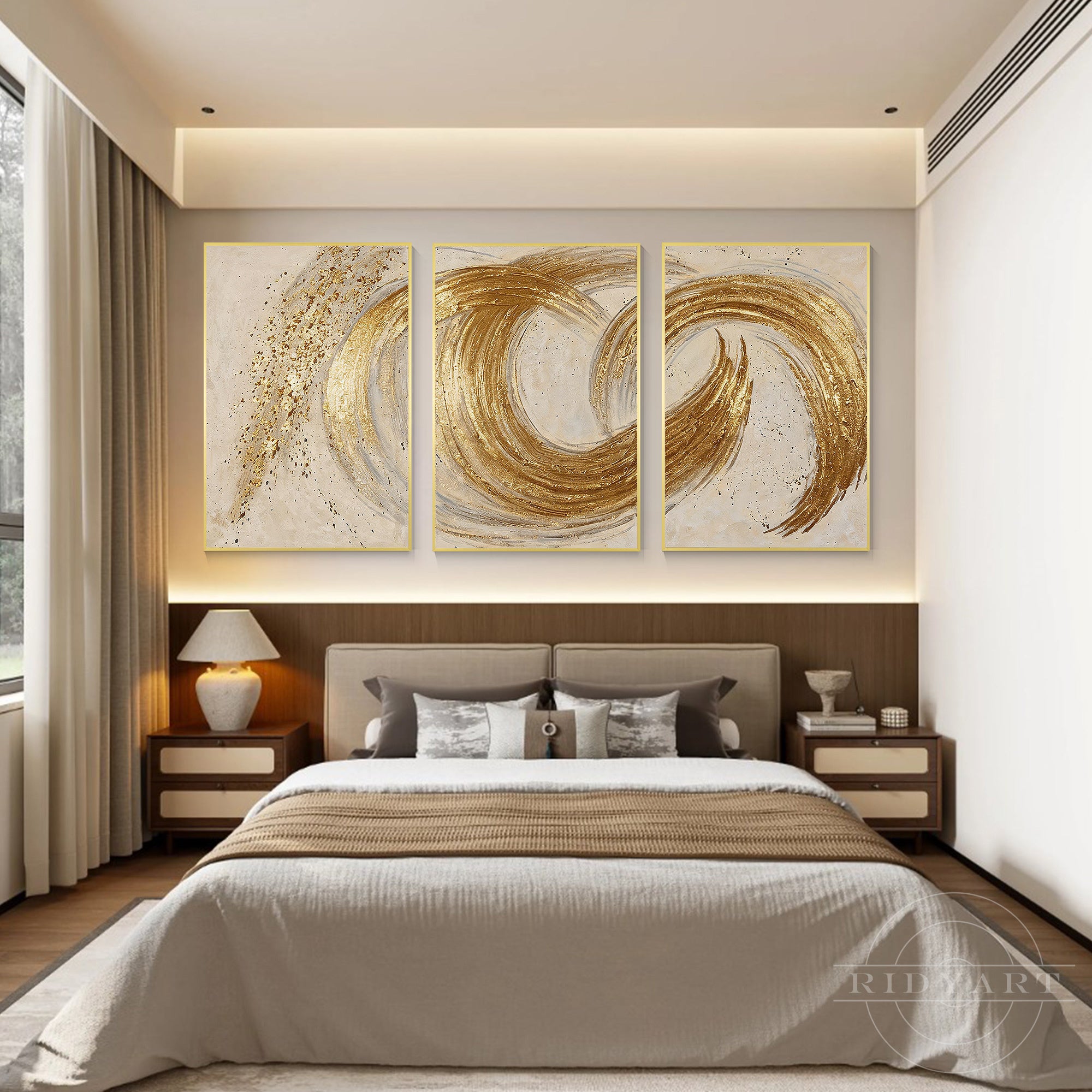 Textured gold leaf 3-piece abstract canvas wall art triptych mounted above the headboard of a cozy, elegant primary bedroom with warm ambient lighting.