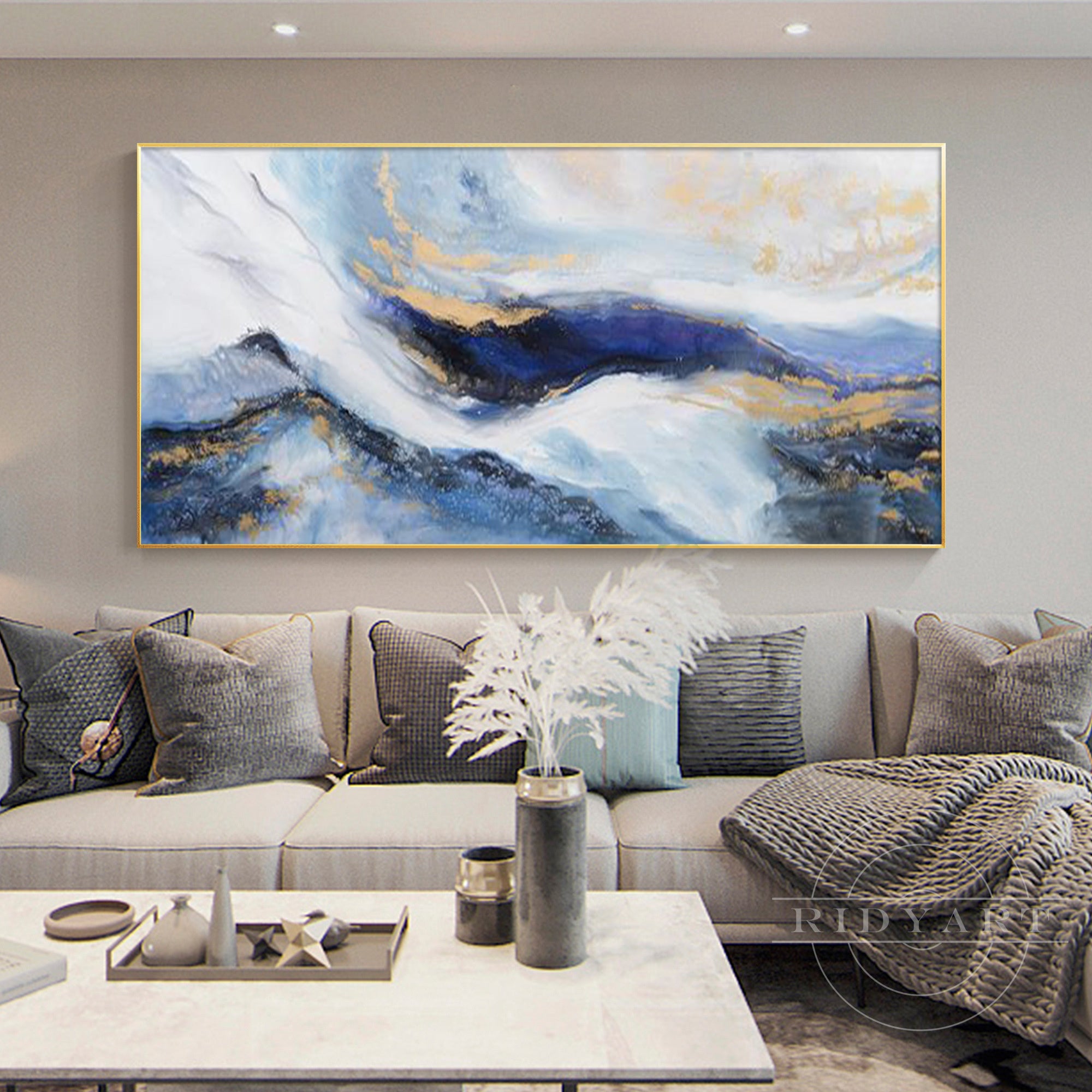 Abstract blue and gold wall art with a textured landscape design