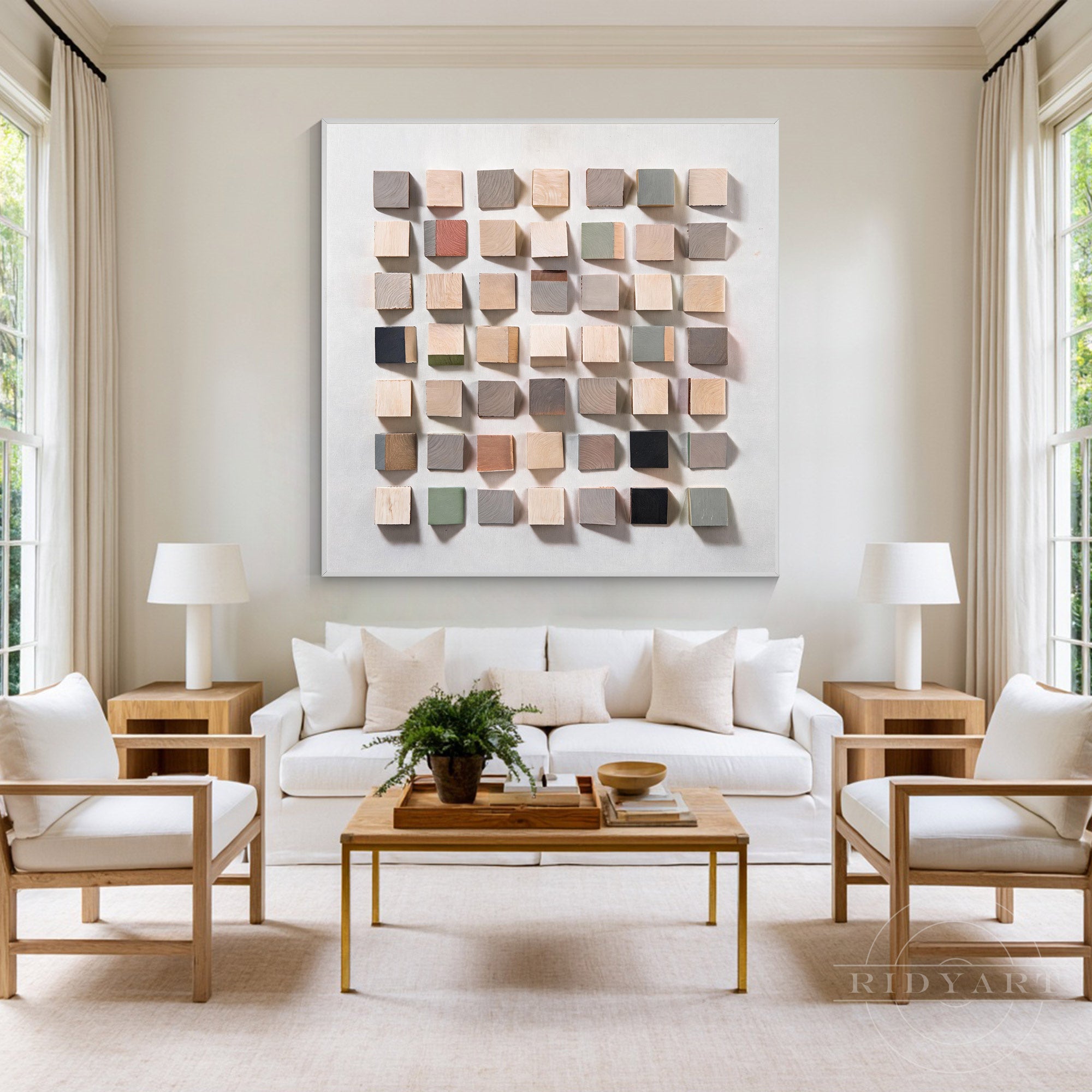 Modern textured wood cube canvas sculpture featuring neutral earth tones displayed in a bright minimalist living room.