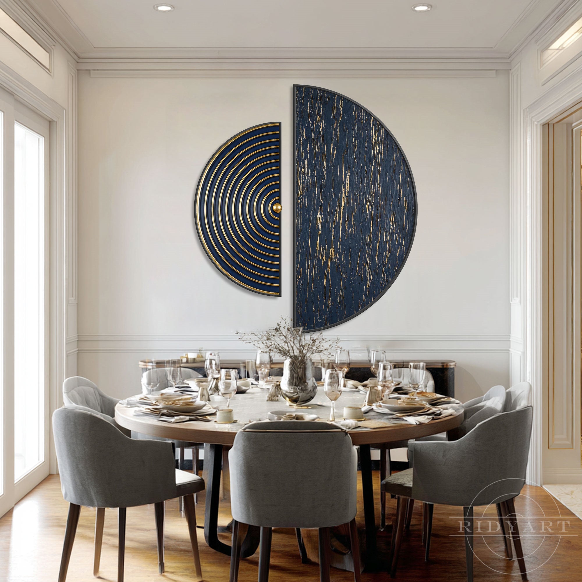 This striking, modern half circle wall art set featuring deep navy blue and textured gold foil perfectly complements this elegant dining room space. 