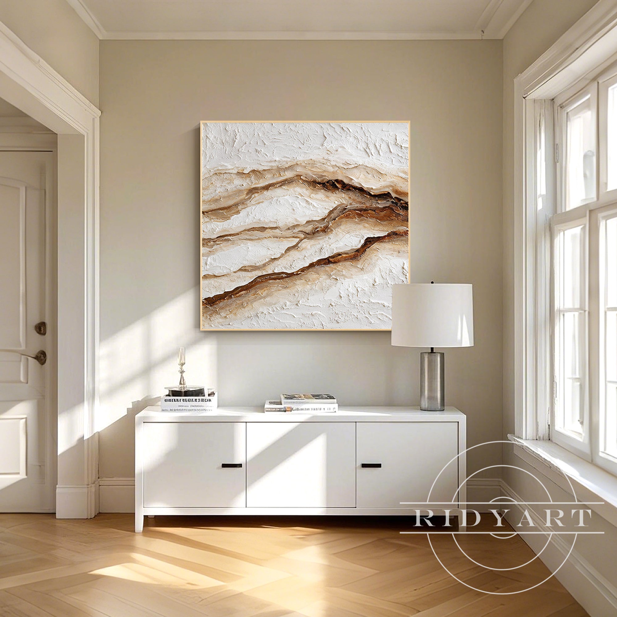 Close-up view of dynamic hand-carved impasto texture in off-white and deep brown acrylic paints on a square canvas.