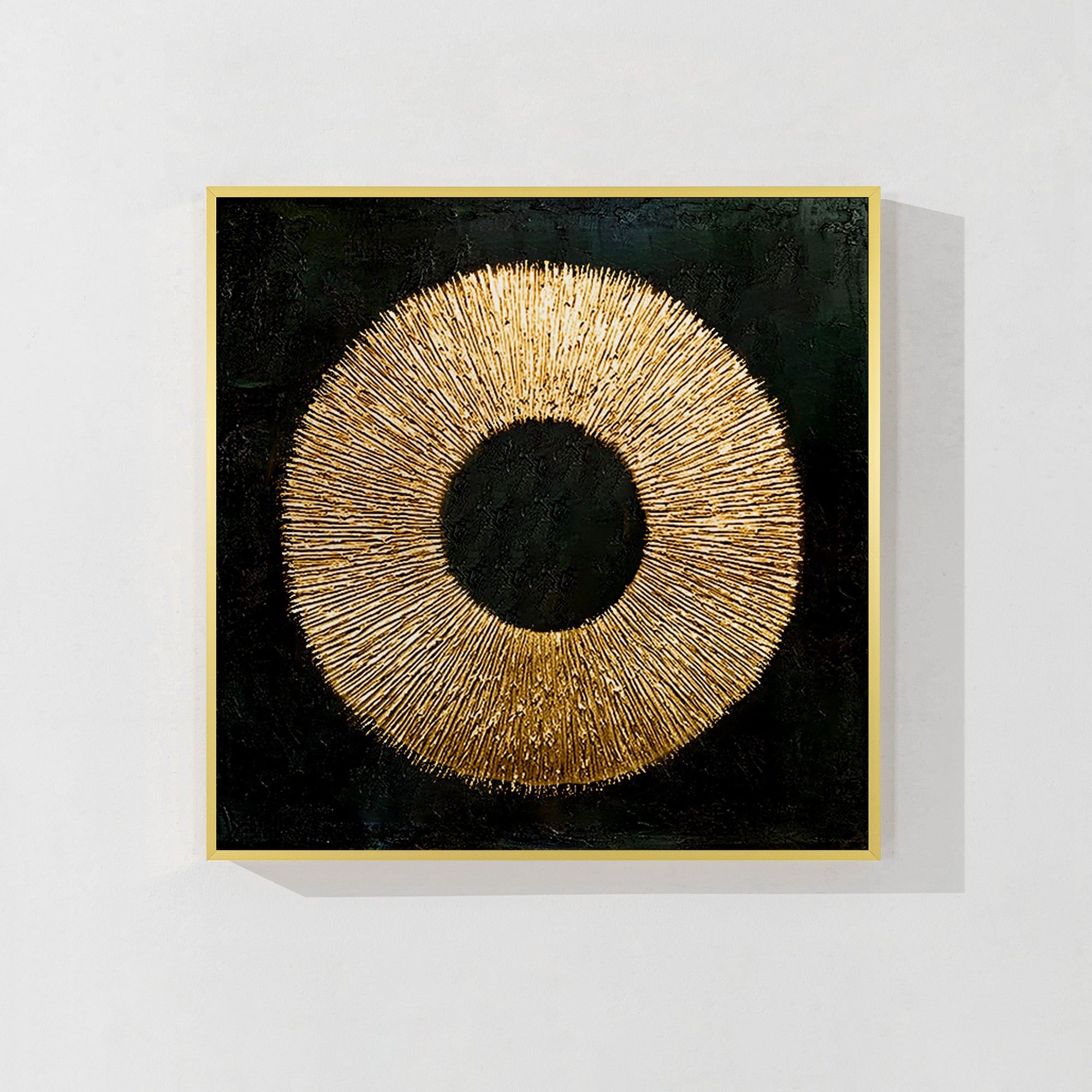 Enso circle abstract wall art with black, gold, and textured details.