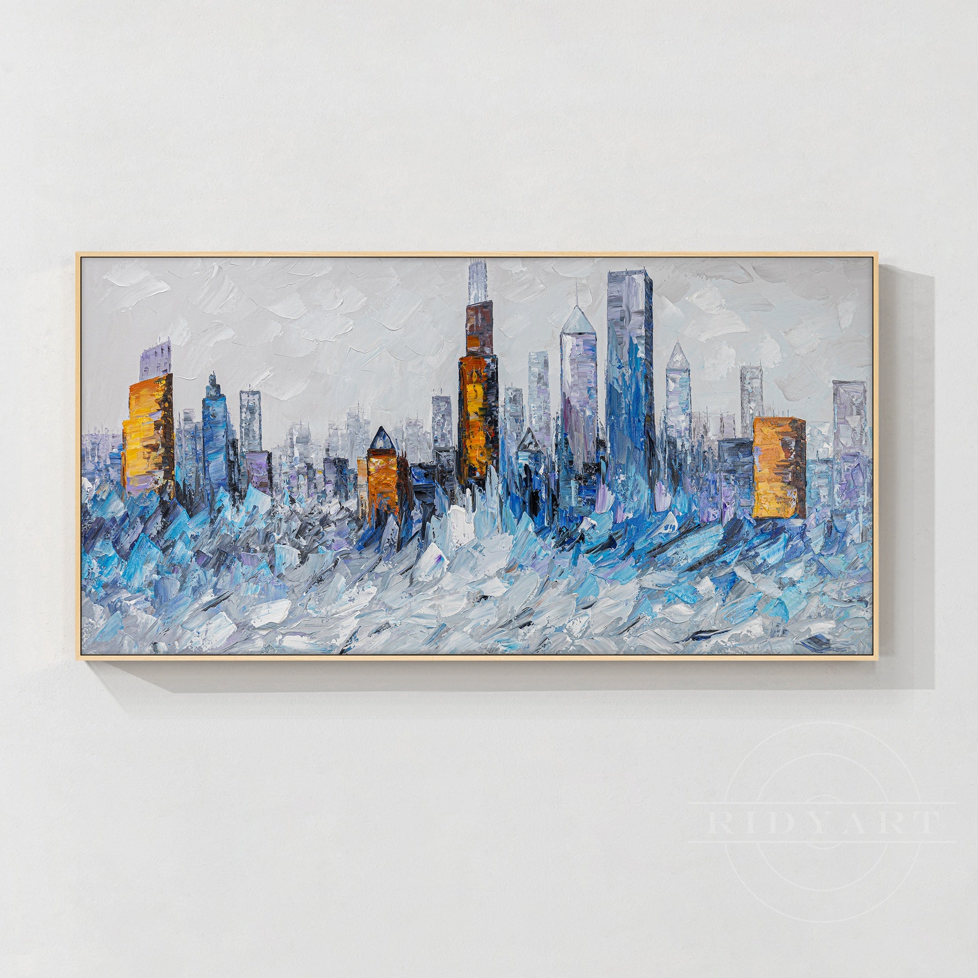 Abstract Chicago skyline painting in blue and gold.