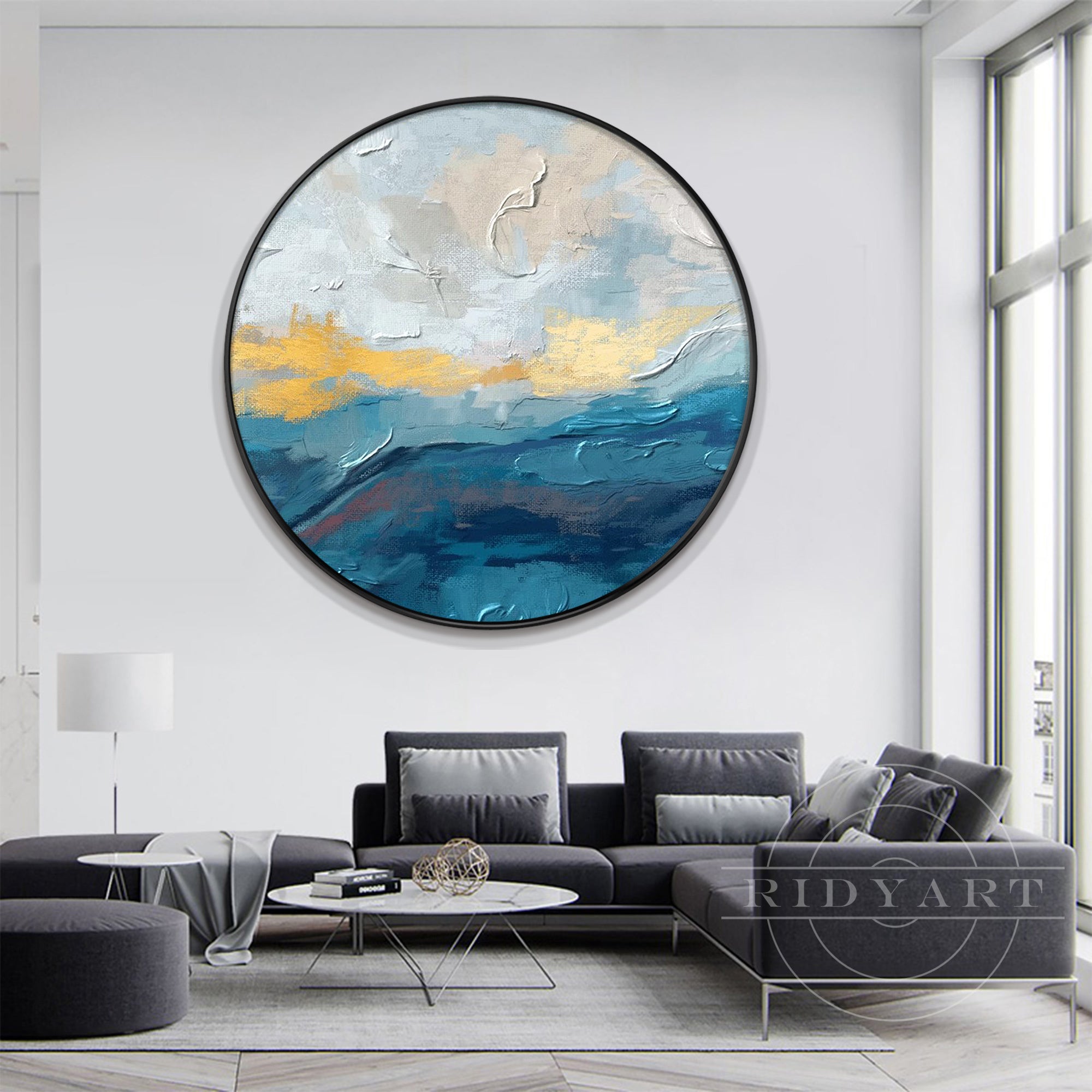 Circular blue and gold canvas art with abstract design