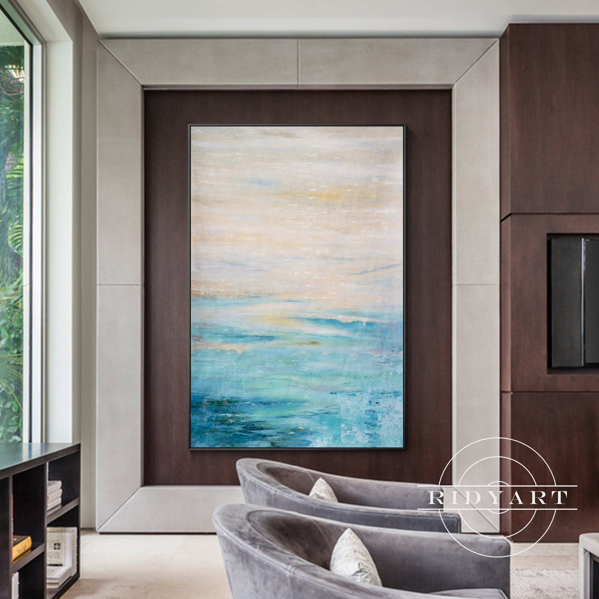 Coastal wall art with blue sea and soft sky tones
