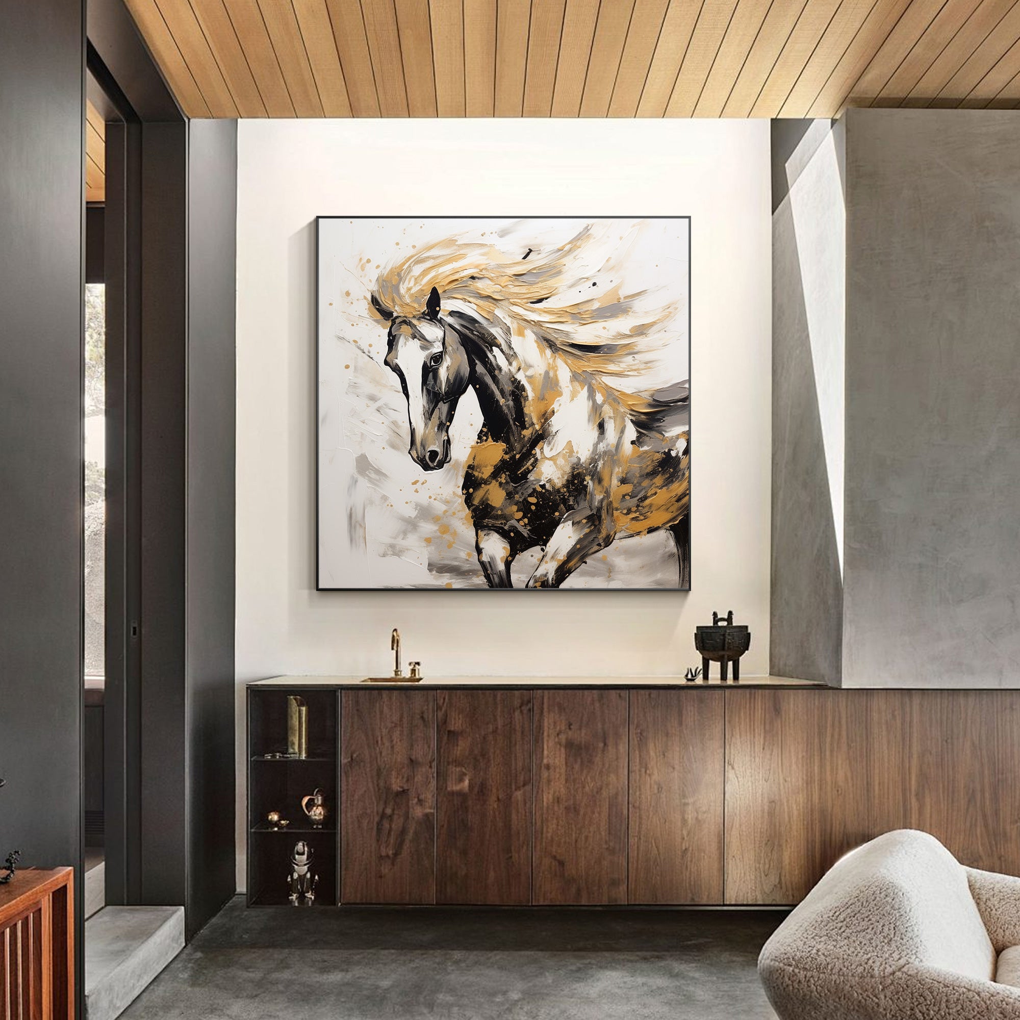 Black and gold running horse painting on canvas with metallic accents.

