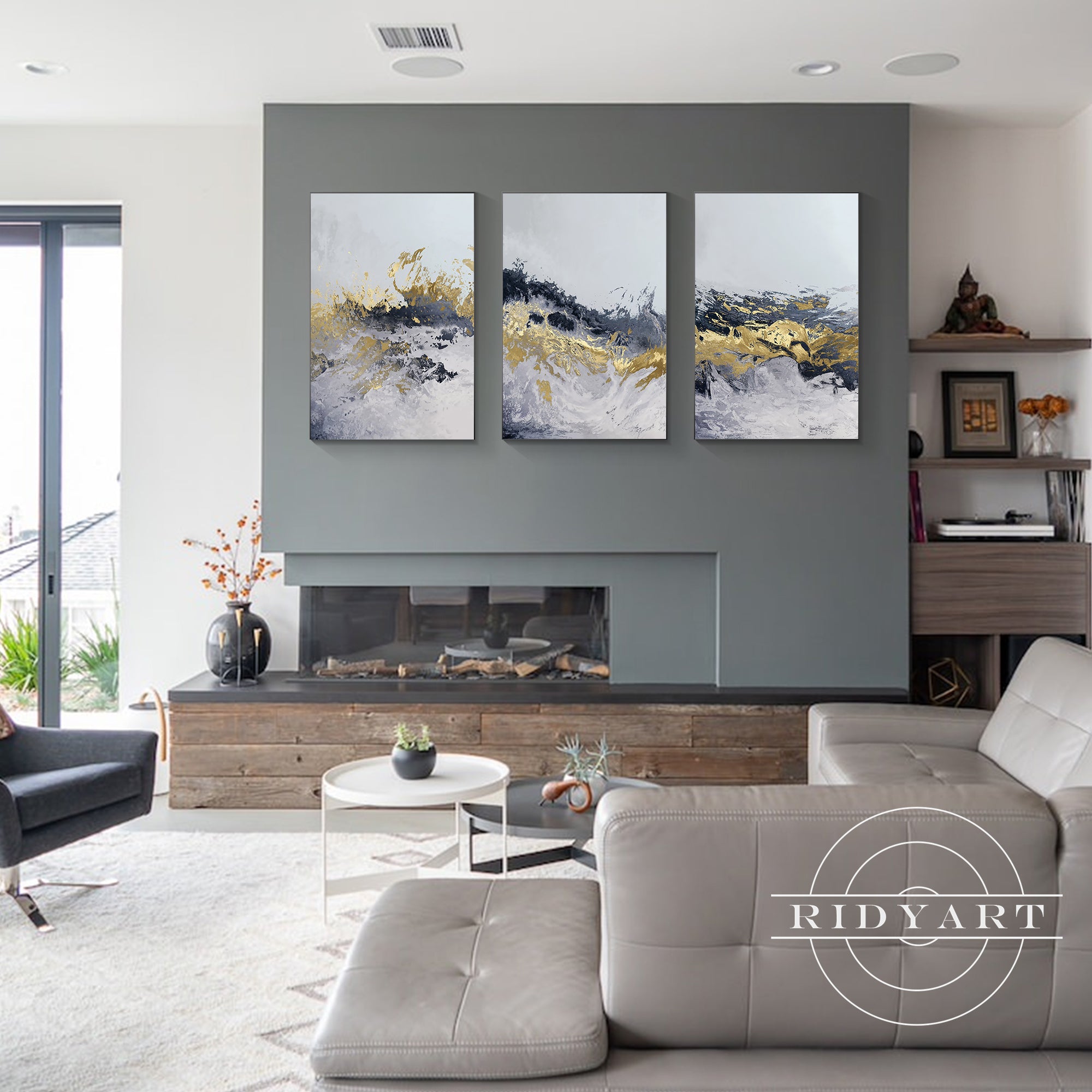 Trio of gold and blue mountain wall art for contemporary interiors.