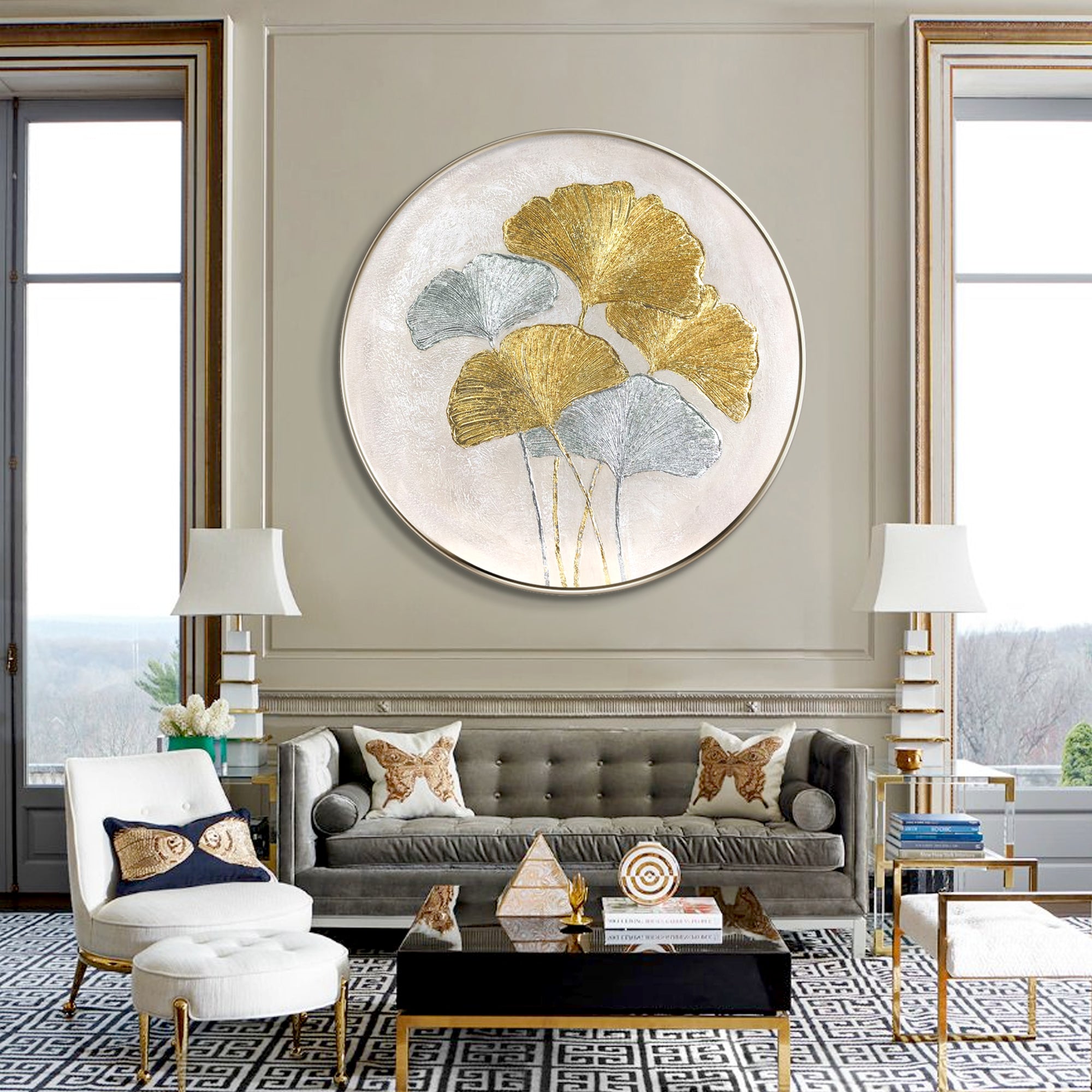 Ginkgo leaves painting featuring gold and silver foil accents. Round textured minimalist wall art for elegant and luxurious interior design.

