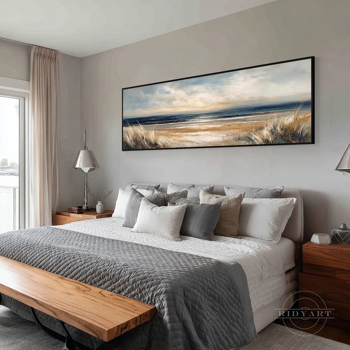 Panoramic blue ocean wall art with a warm golden sky and subtle reflections across the shoreline