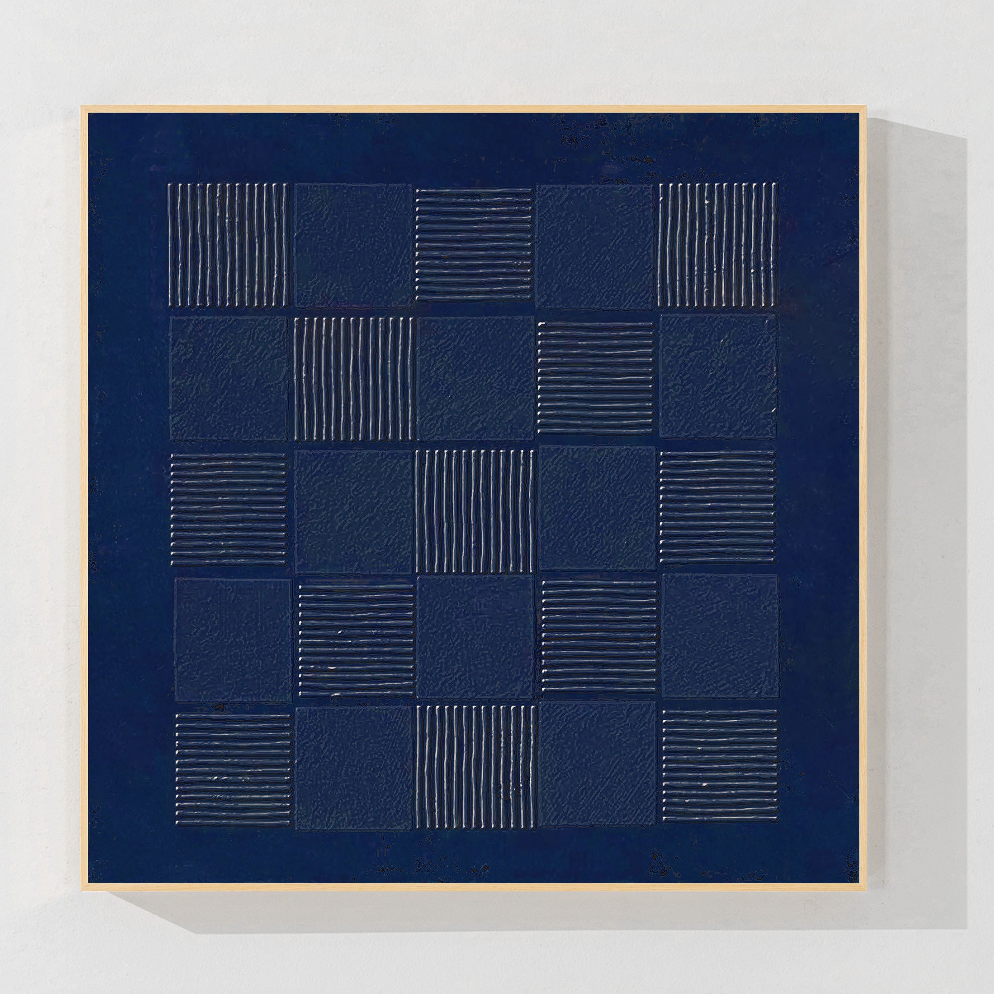 Handmade navy blue abstract painting with textured grid design