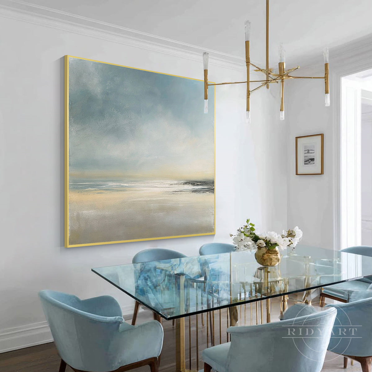Oversized square coastal landscape artwork, bringing a peaceful and airy ambiance to the room decor.