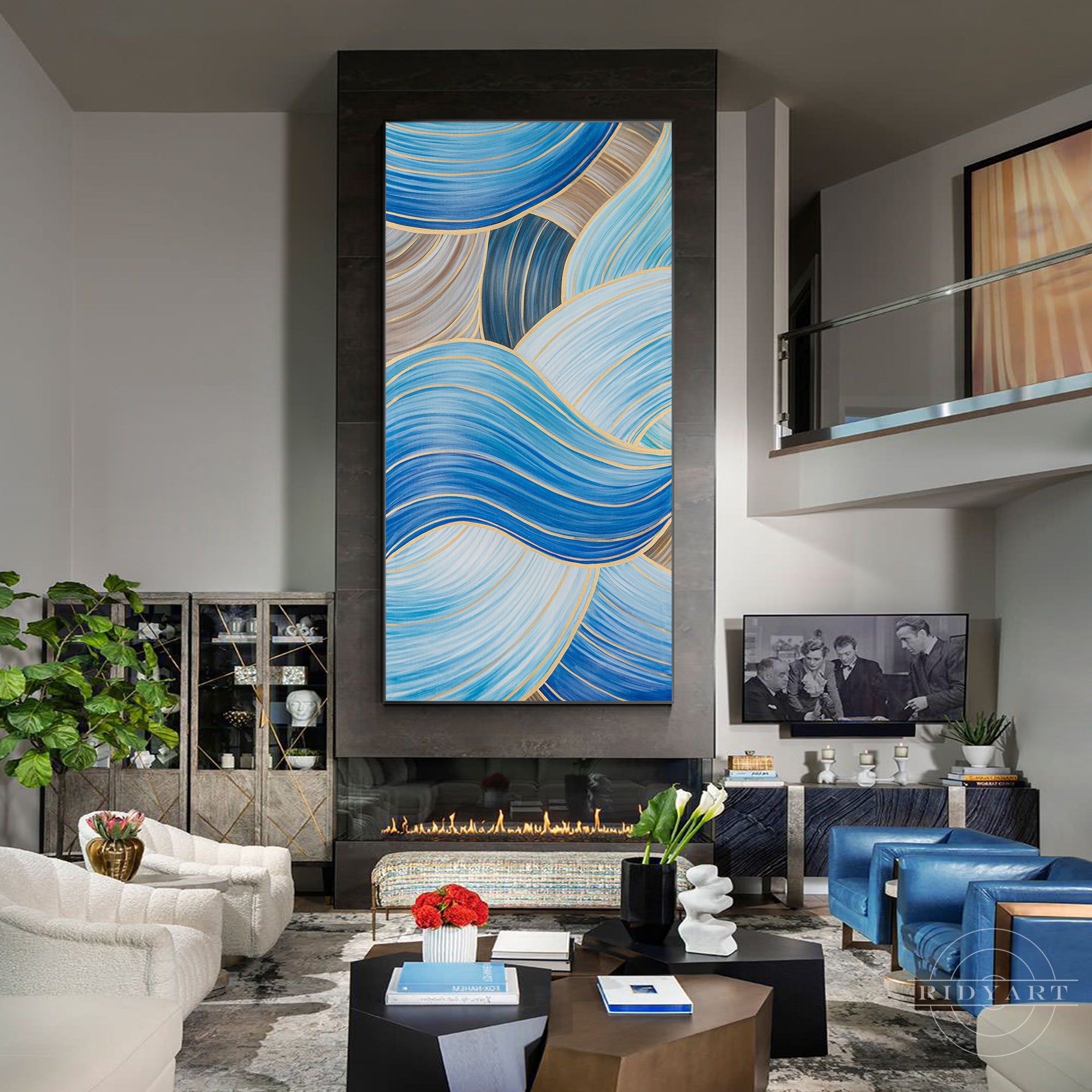 Blue and gold abstract ribbon painting on canvas.
