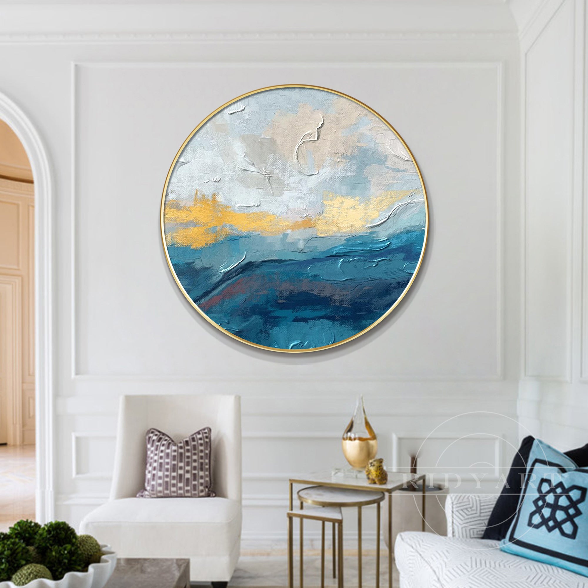 Minimalist round wall art featuring blue and gold abstract elements