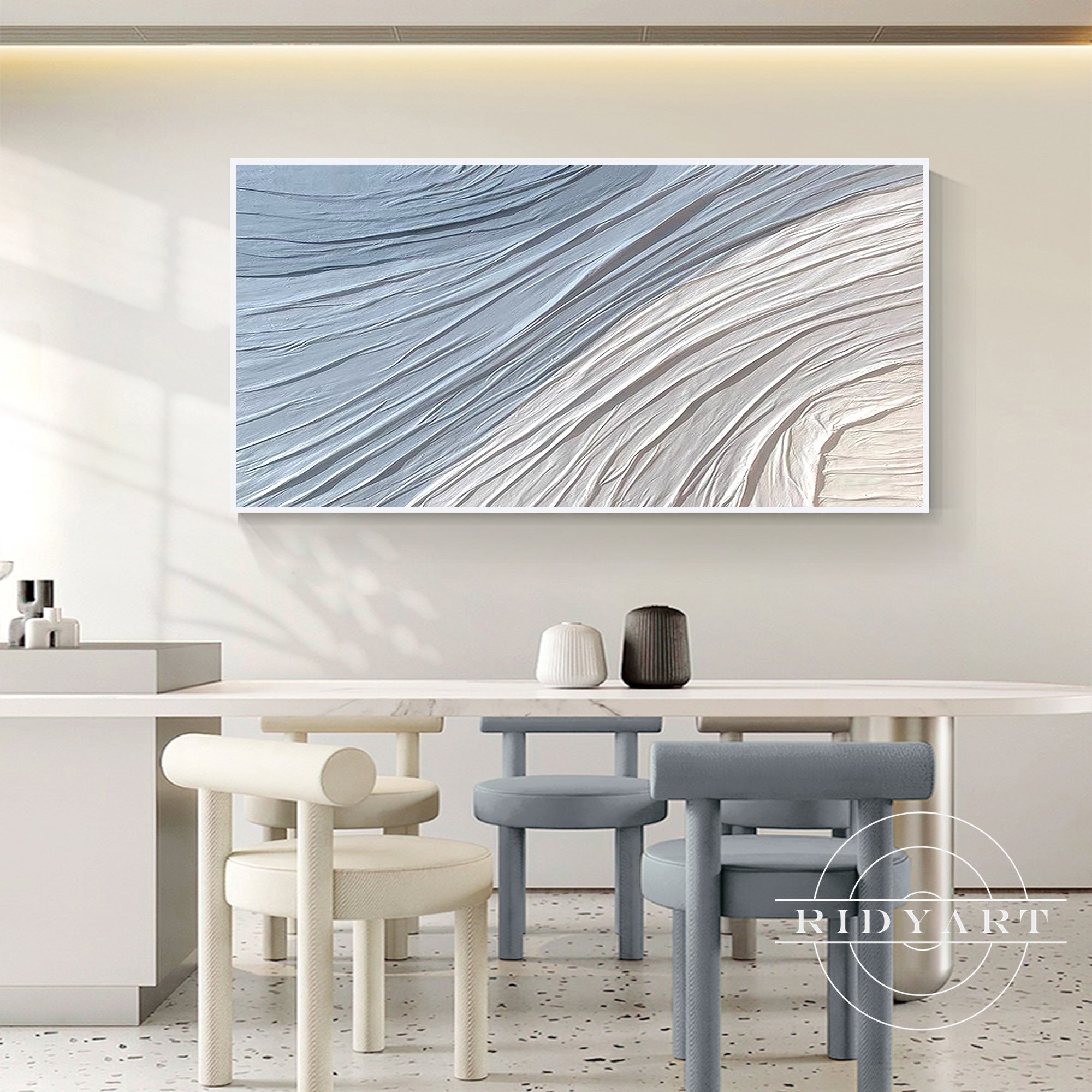 Horizontal abstract plaster painting in blue and cream