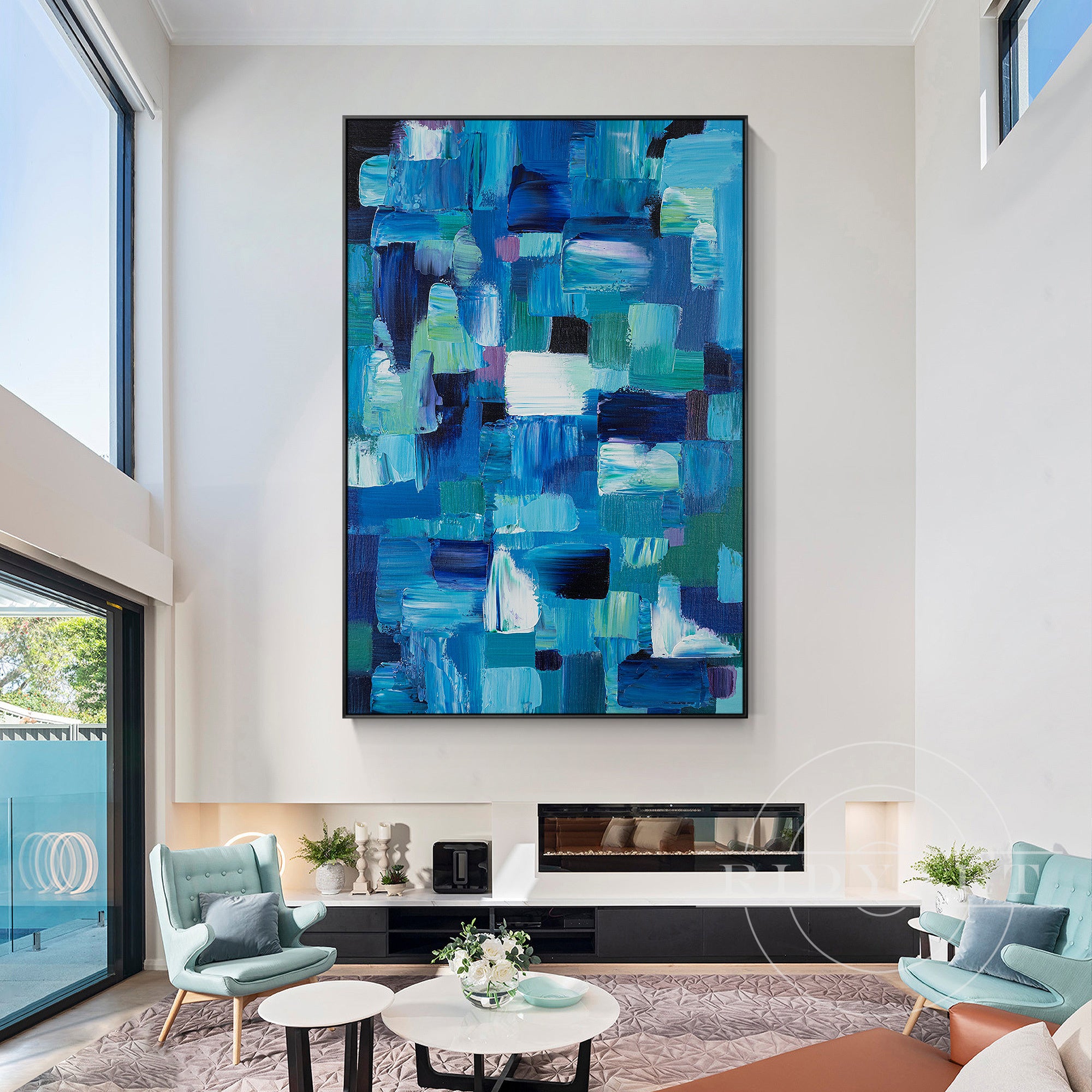 Modern abstract art featuring blue hues and dynamic textured blocks