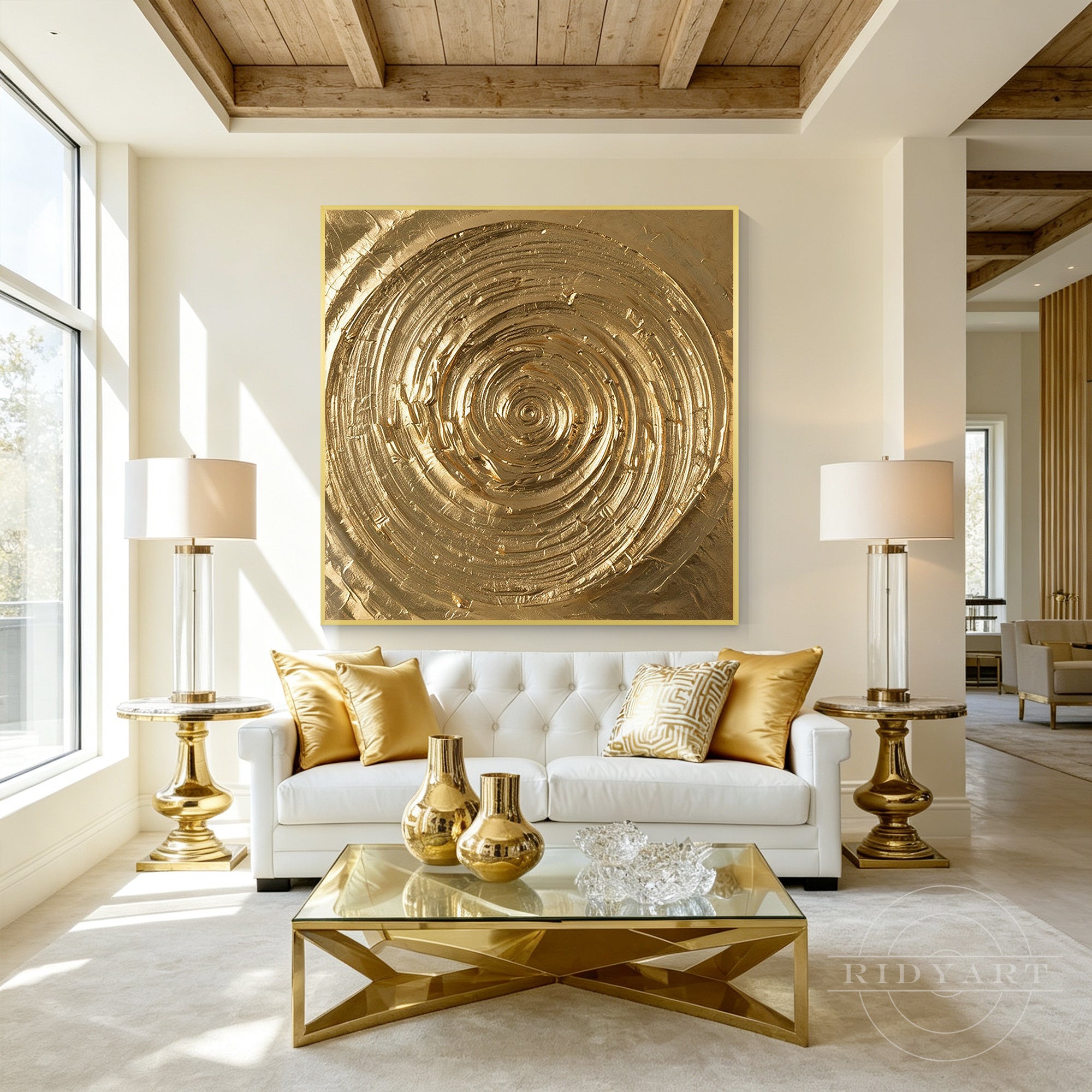 Large gold metallic swirl canvas wall art hanging above a sofa in a modern luxury living room.