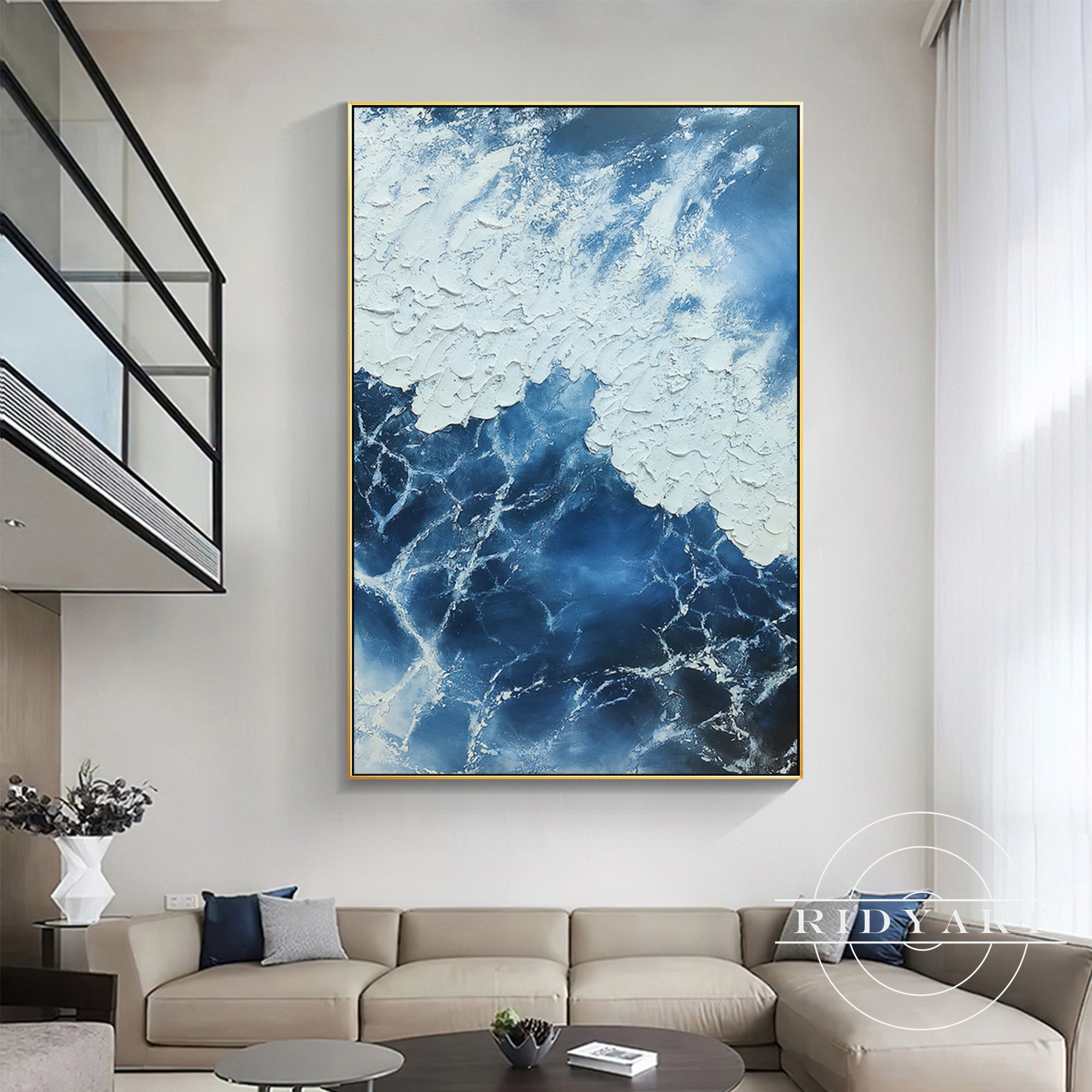 Textured ocean wall art in navy blue and white tones for modern interiors.