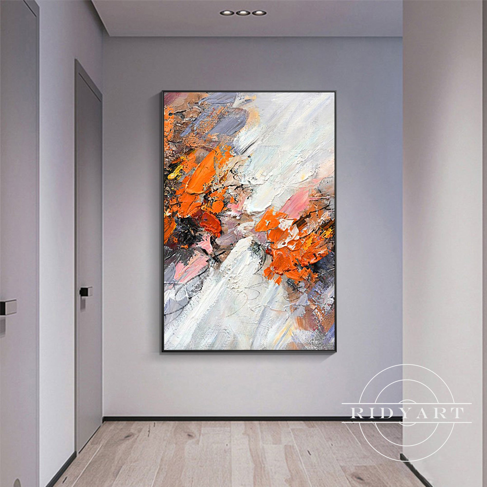 Modern wall art with dynamic brushstrokes in orange and white.