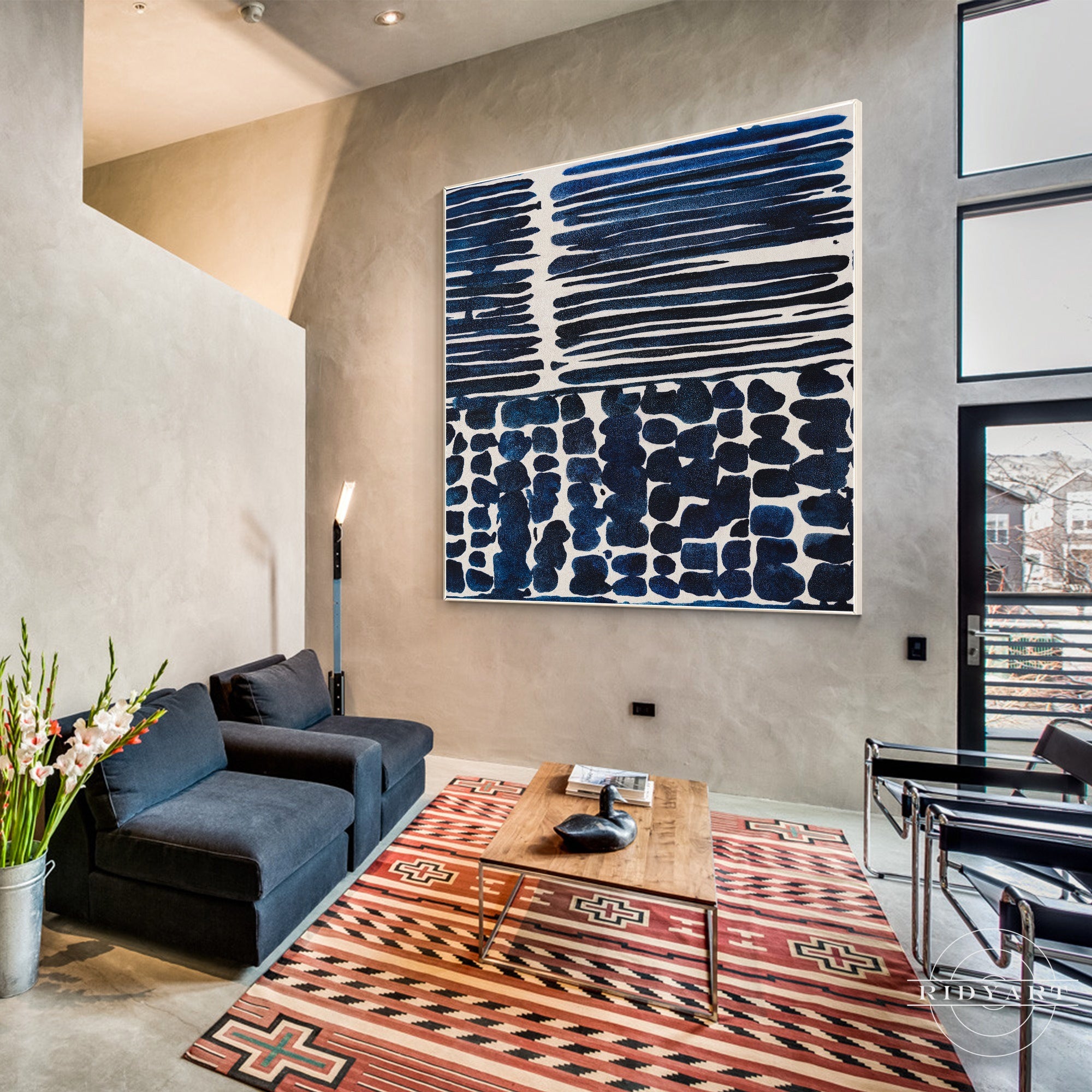 Navy blue textured abstract painting on canvas, framed wall art.
