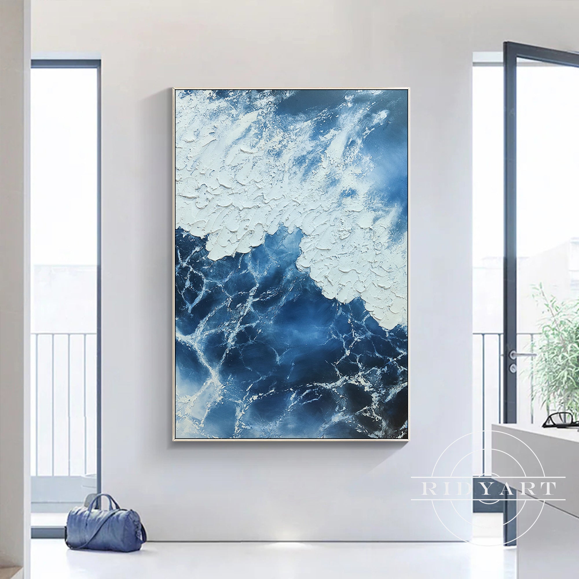 Navy blue ocean wall art with white textured painting for home decor.