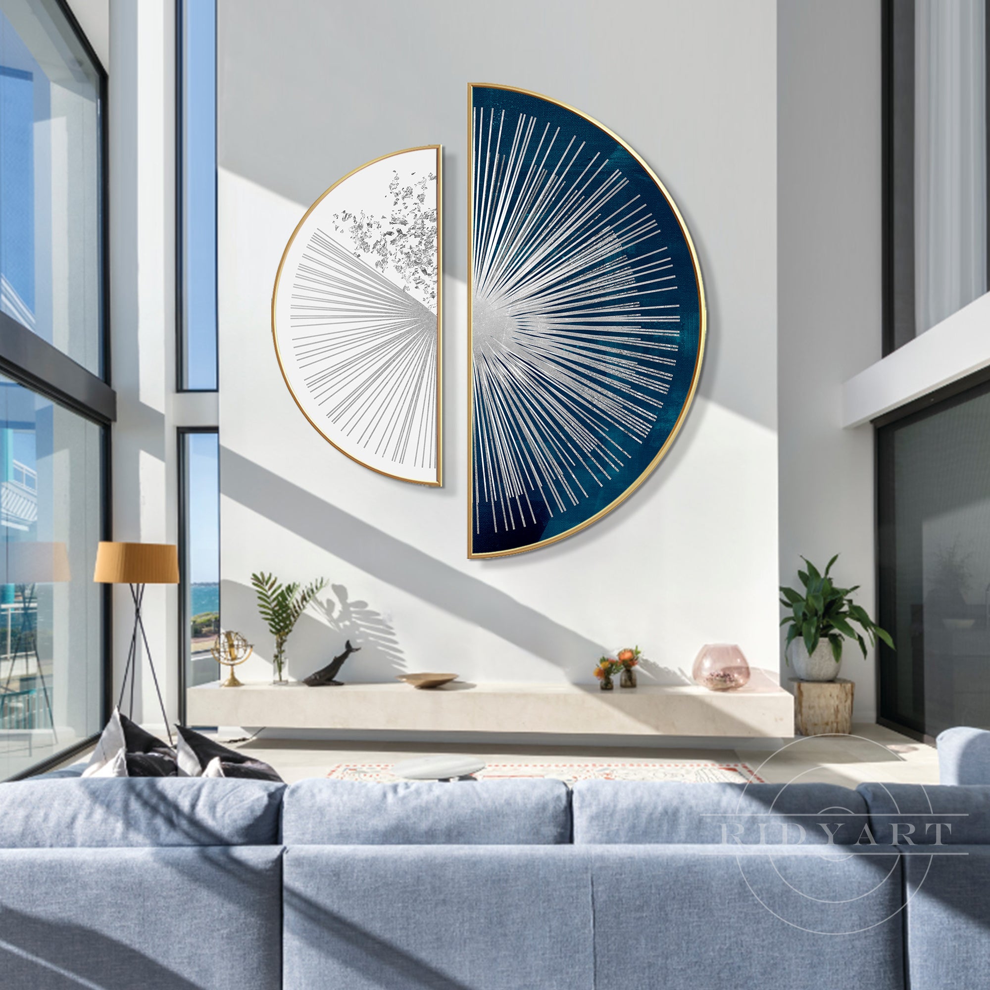 Round wall art with navy blue and silver abstract sunshine design