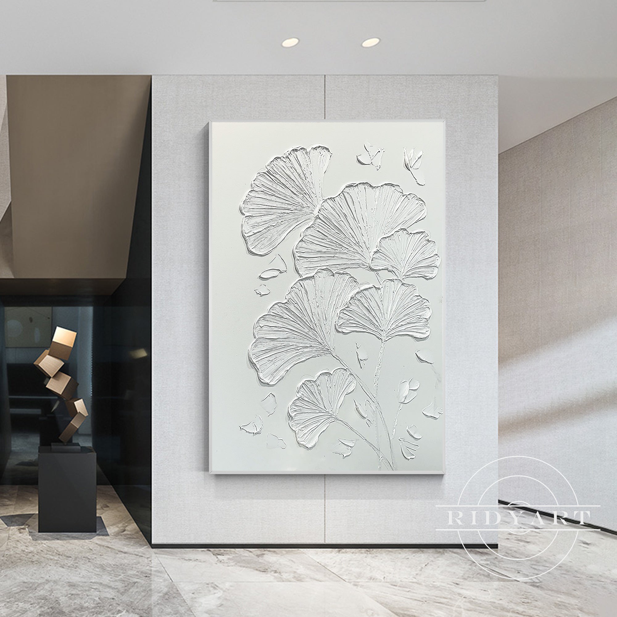 Contemporary plaster wall art with minimalist leaf design