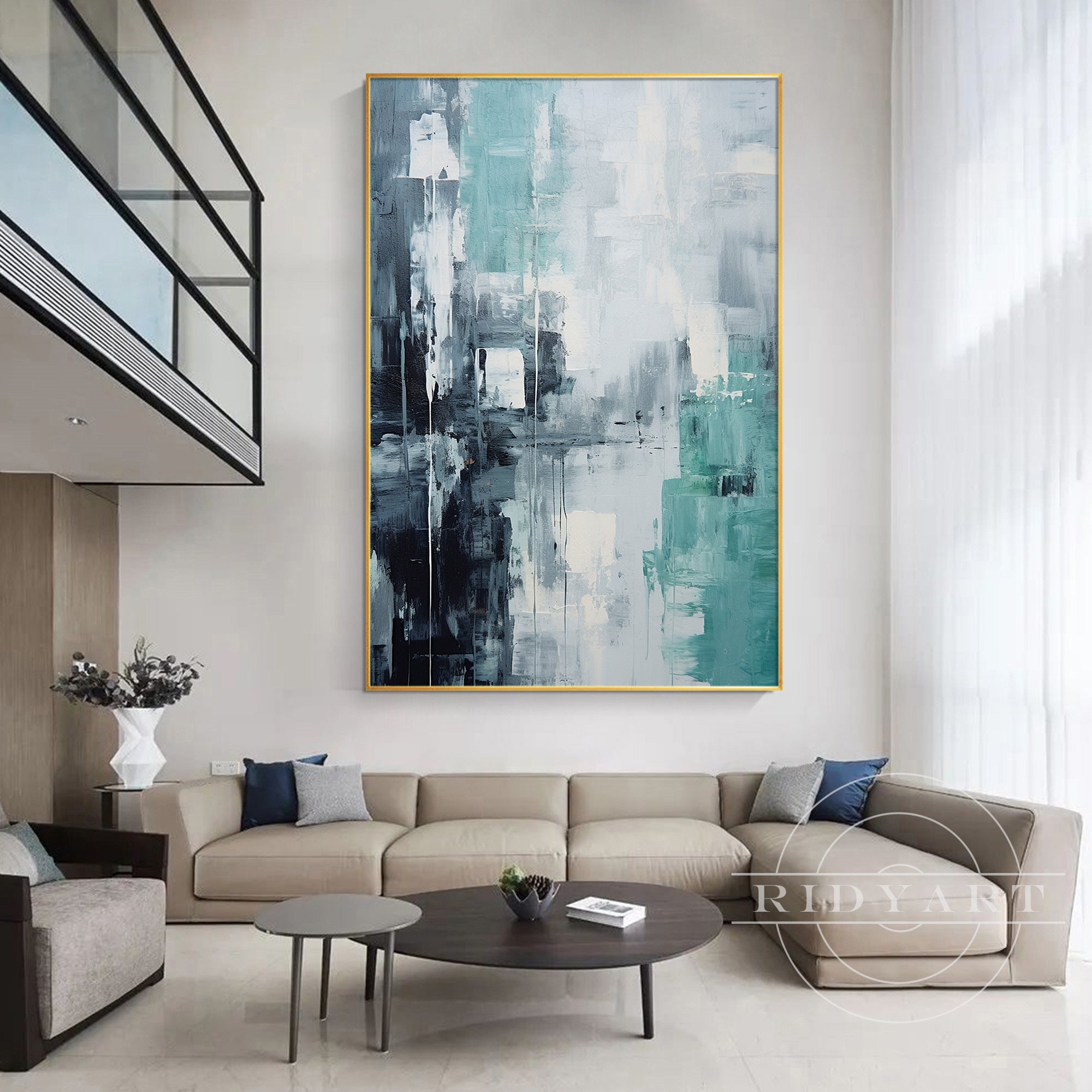 Modern wall art featuring teal and gray hues with bold abstract details