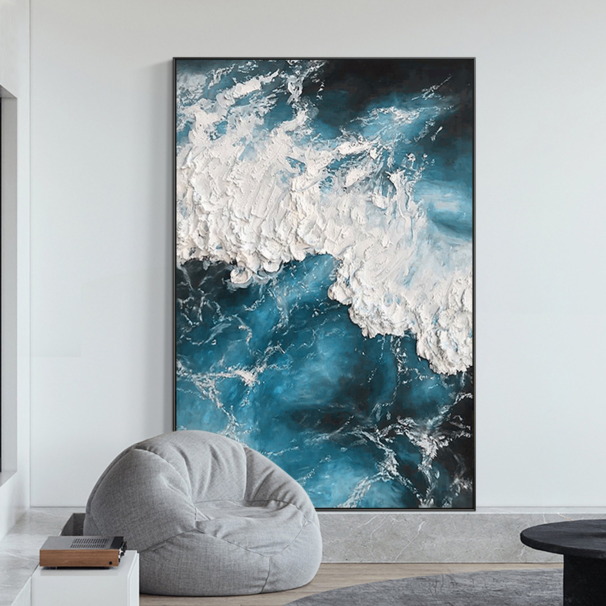 Textured ocean wave painting in deep blue tones for coastal wall decor.