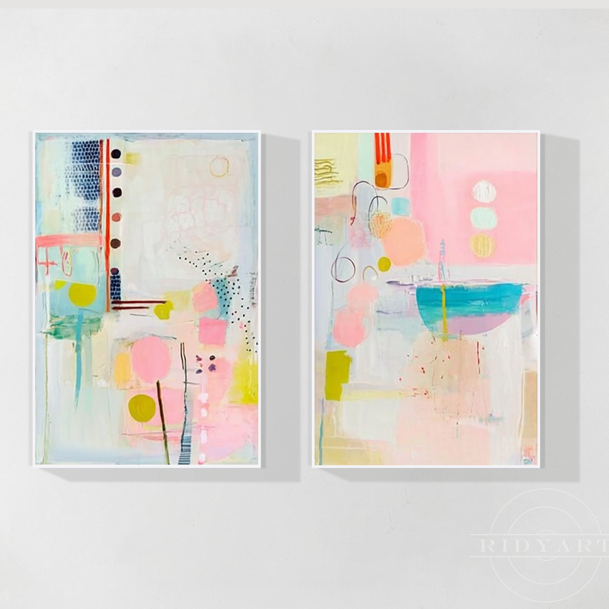 Set of two pastel abstract canvas paintings featuring geometric shapes and contemporary design.