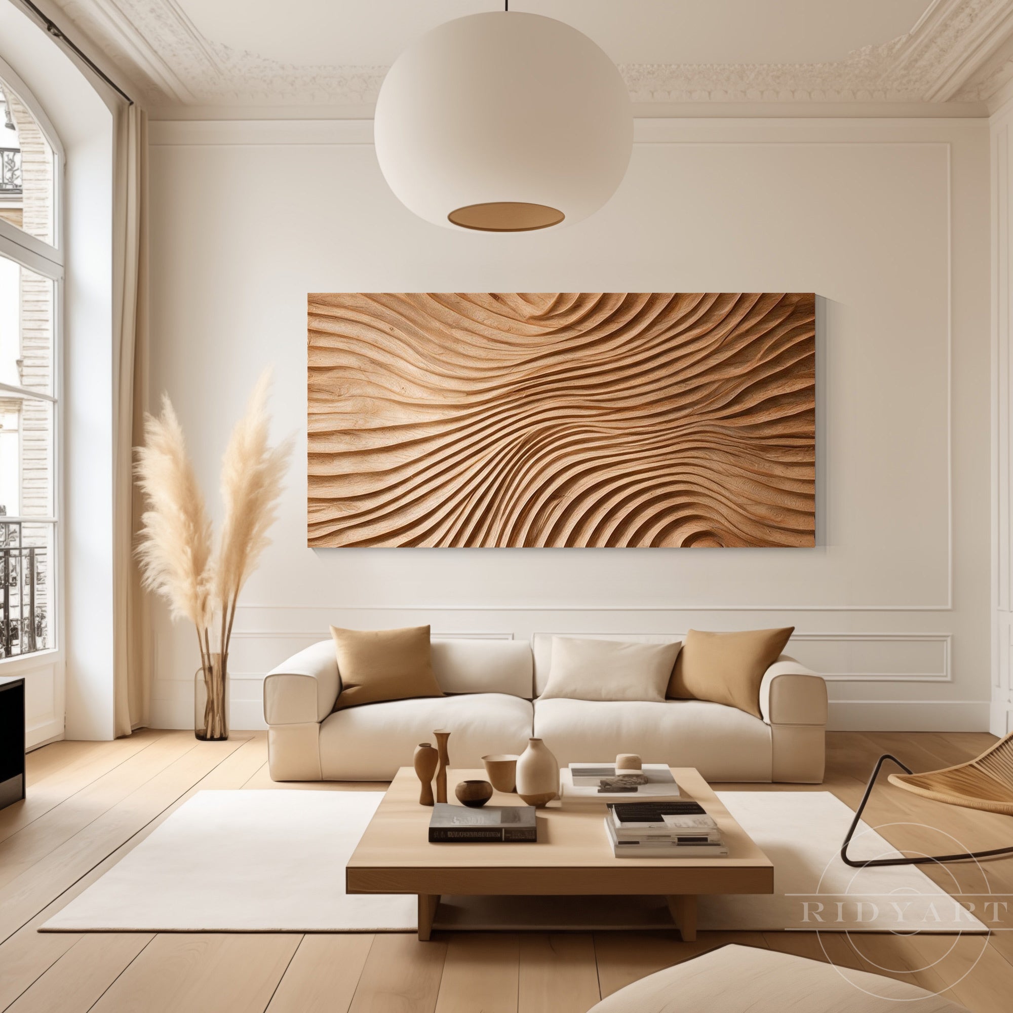 Large horizontal ocean wave carved wood wall art mounted above a modern white sofa in a sunlit Wabi-Sabi living room