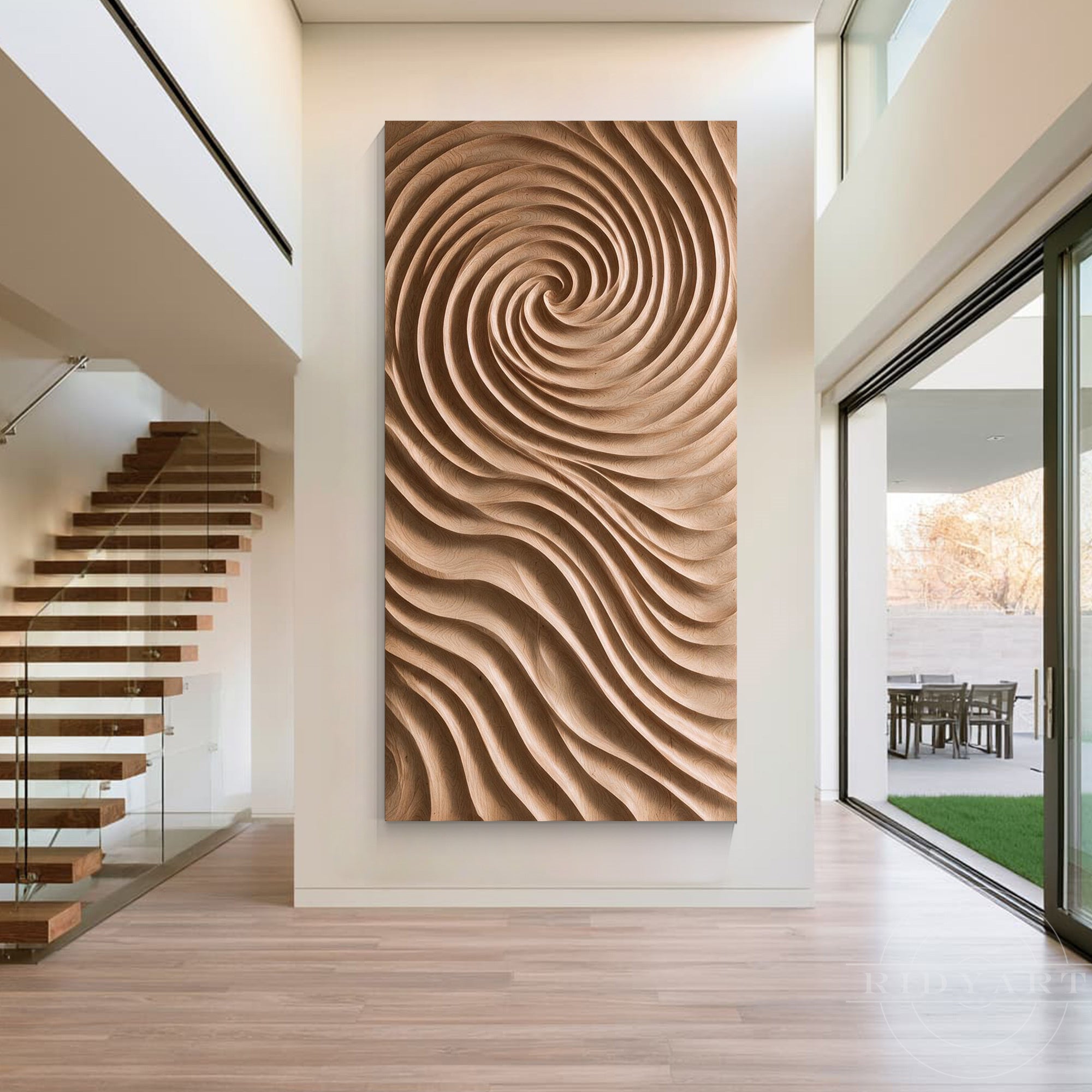 Vertical swirl wood carved wall art displayed on a tall white accent wall in a multi-level minimalist home